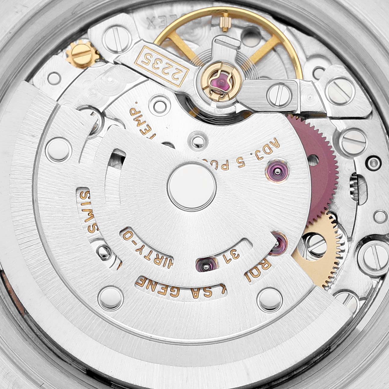 This close-up image shows the intricate movement mechanism of the Rolex Datejust 79174 Women's Stainless Steel Pink Dial 79174 Women's Stainless Steel Pink Dial watch.