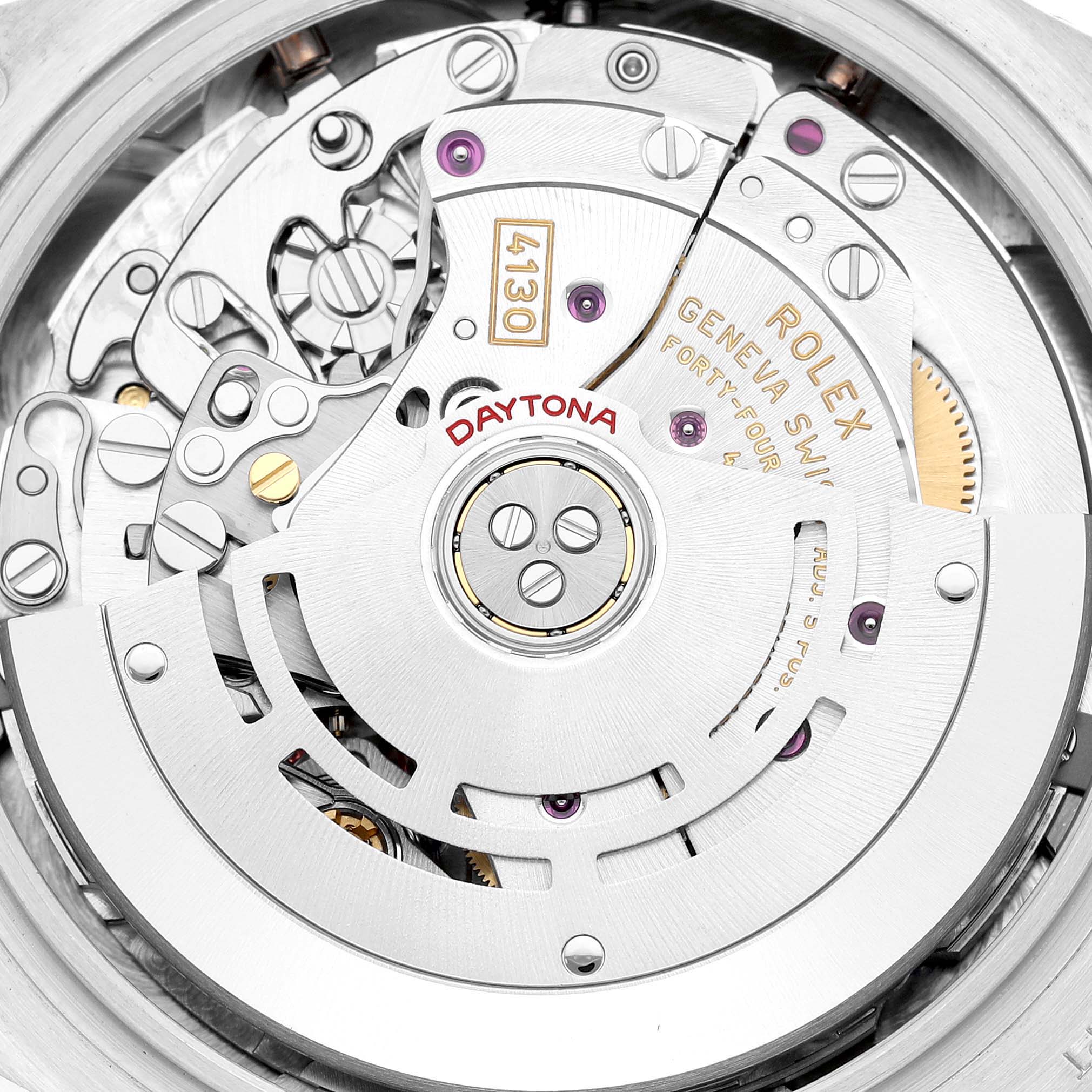 The image shows a close-up view of the movement mechanism of a Rolex Daytona 116506 Men's Platinum Blue Dial 116506 Men's Platinum Blue Dial watch, highlighting intricate mechanical components.