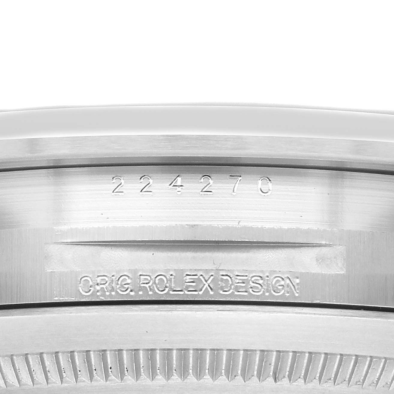 The image shows the side profile of the Rolex Explorer 224270 Men's Stainless Steel Black Dial, focusing on the engraved reference number and "Orig. Rolex Design."