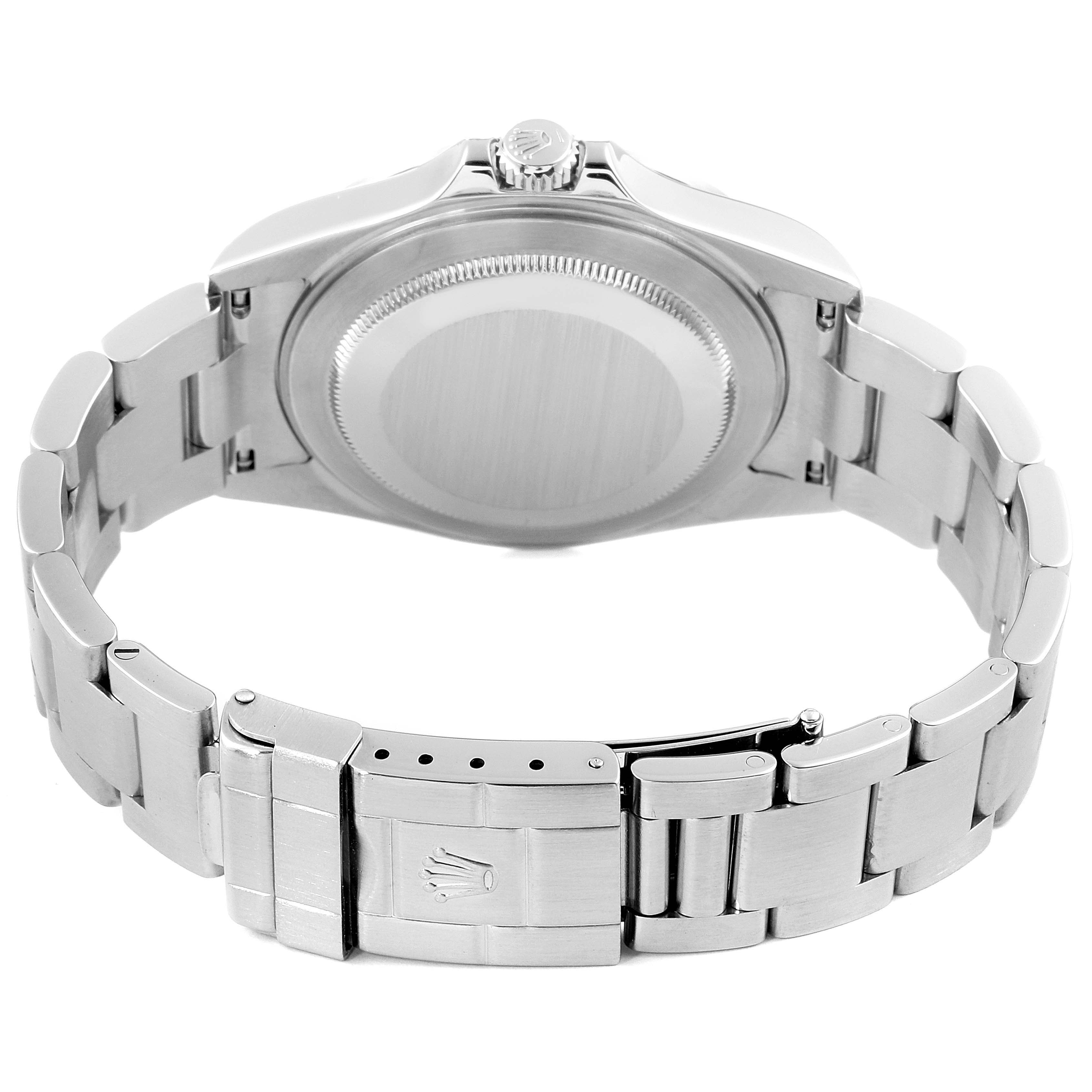 The image shows the back view of a Rolex Explorer 16570 Men
s Stainless Steel White Dial 16570 Men
s Stainless Steel White Dial watch, highlighting its case back and stainless steel bracelet.