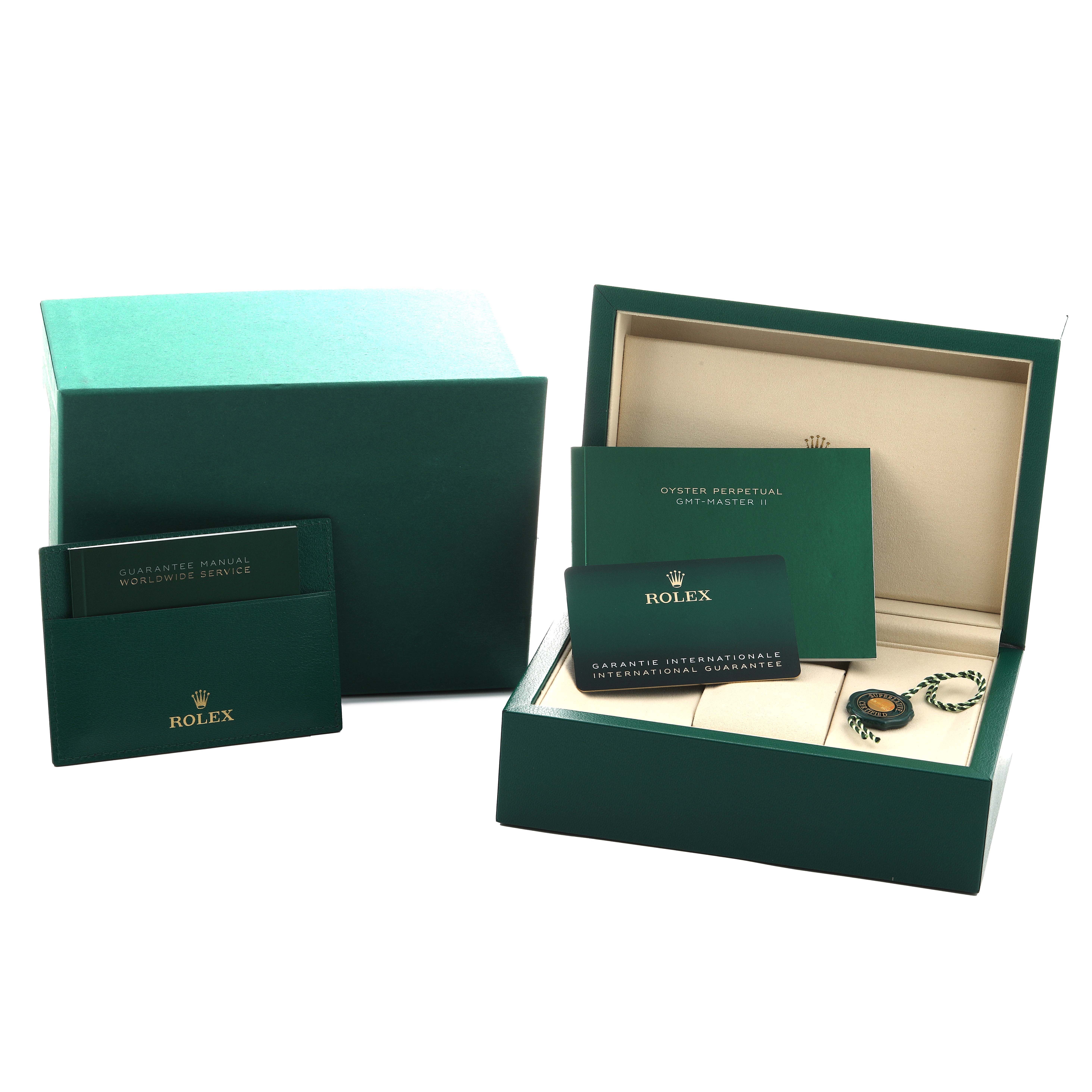 The image shows the packaging and documentation for a Rolex GMT-Master 126710 Men's Stainless Steel Black Dial, including the box, manuals, and guarantee card.