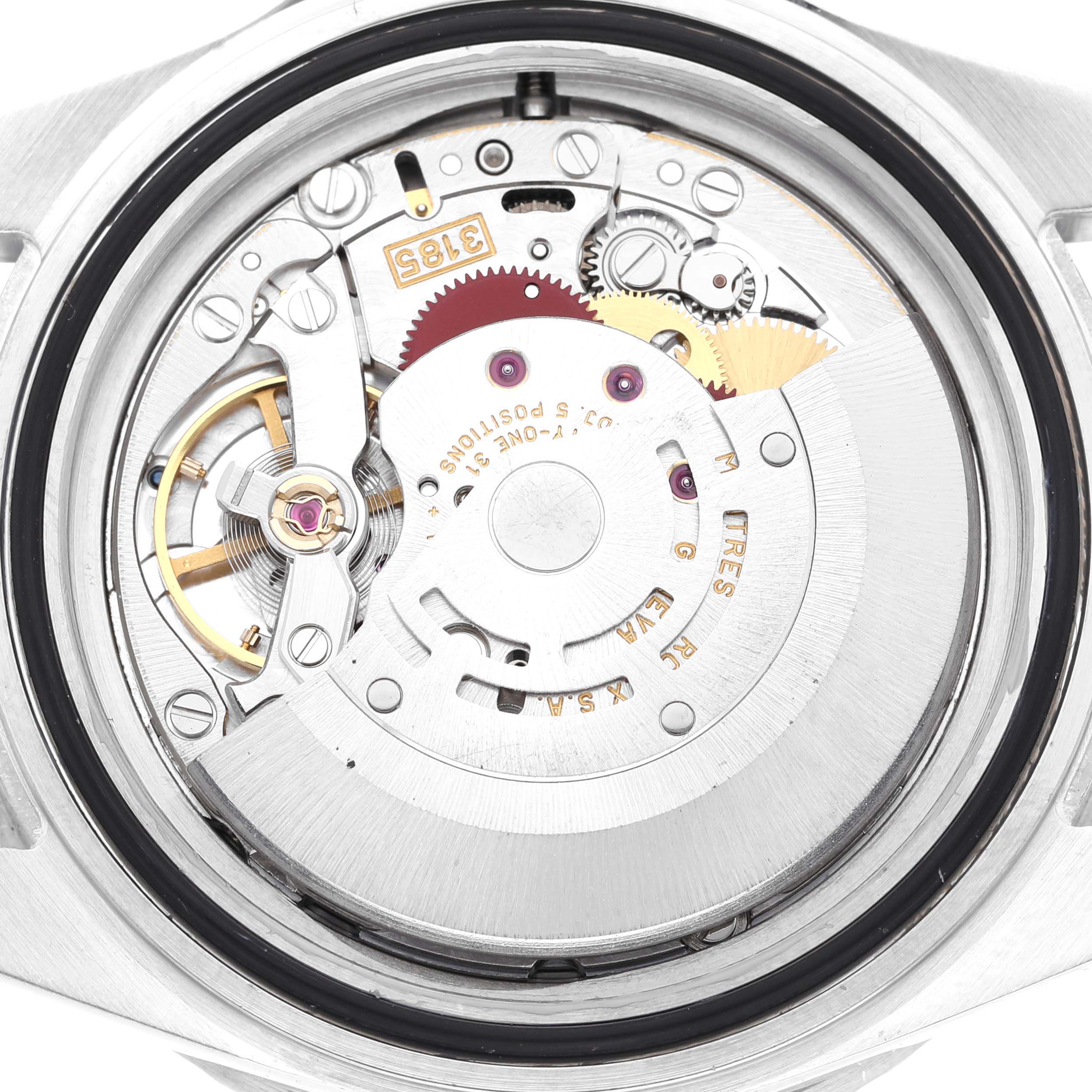 The image shows a close-up of the movement inside a Rolex GMT-Master 16710 Men's Stainless Steel Silver Dial 16710 Men's Stainless Steel Silver Dial watch, revealing its intricate mechanisms and components.