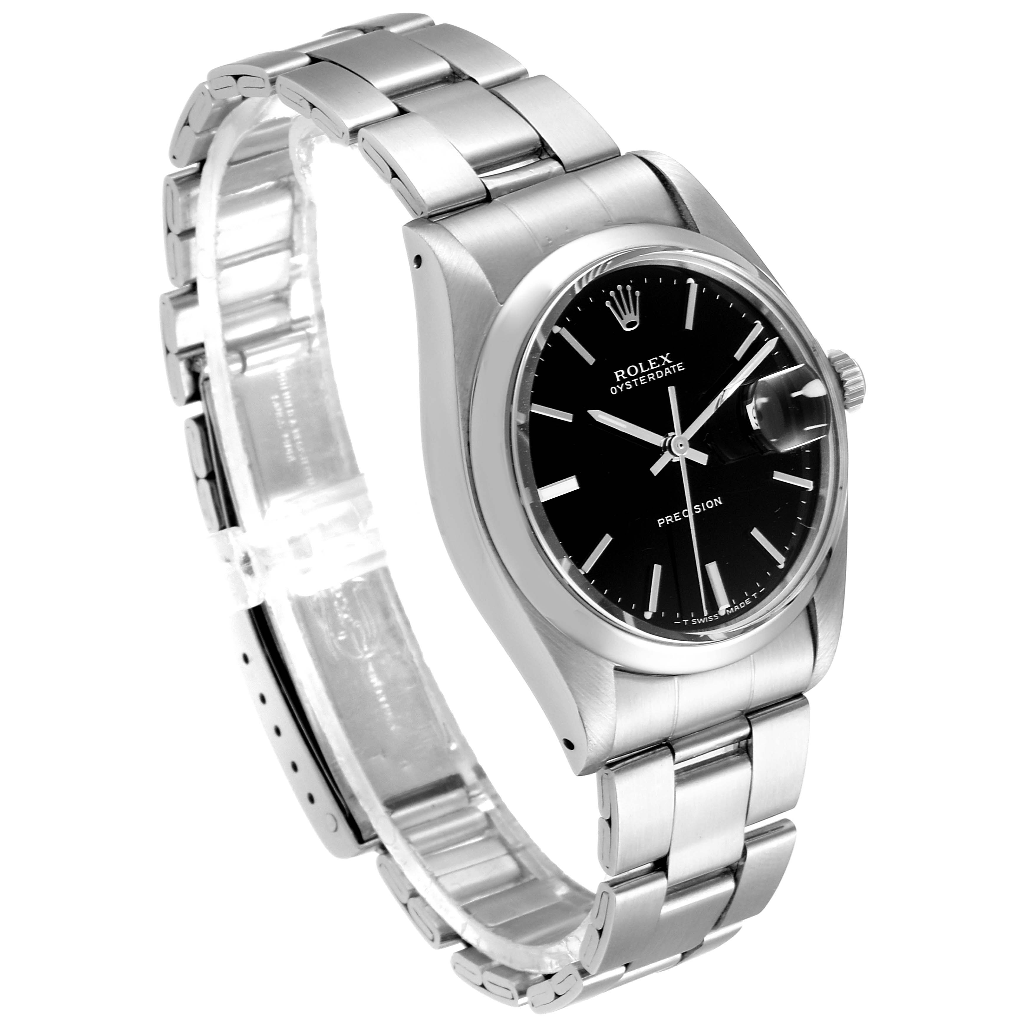 The image shows a Rolex Vintage Collection 6694 Men
s Stainless Steel Black Dial 6694 Men
s Stainless Steel Black Dial watch at a three-quarter angle, highlighting its bracelet, black dial, and case.