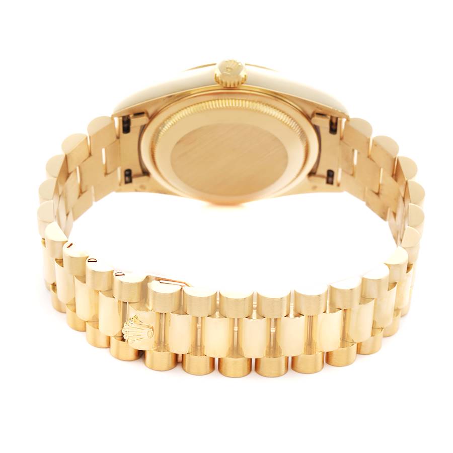 The image shows the back and bracelet of a Rolex President 18238 Men's Yellow Gold Champagne Dial model, highlighting its gold link design and crown clasp.