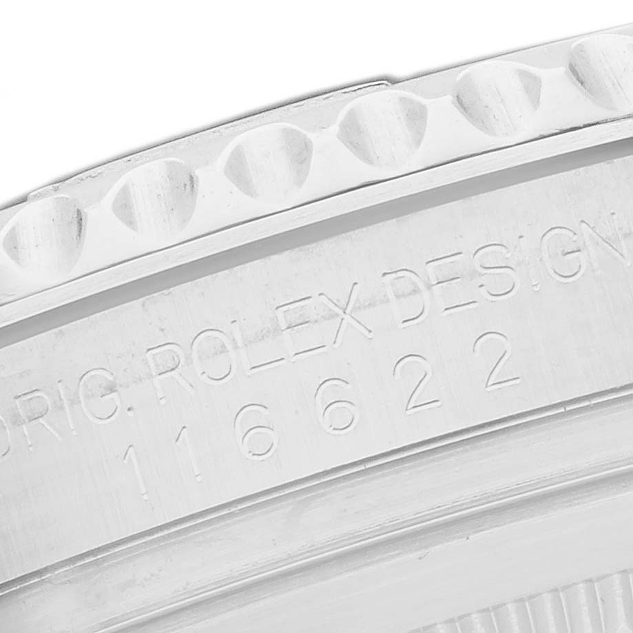 The image shows an angled close-up of the engraved side of the Rolex Yacht-Master 116622 Men's Stainless Steel Blue Dial watch case.