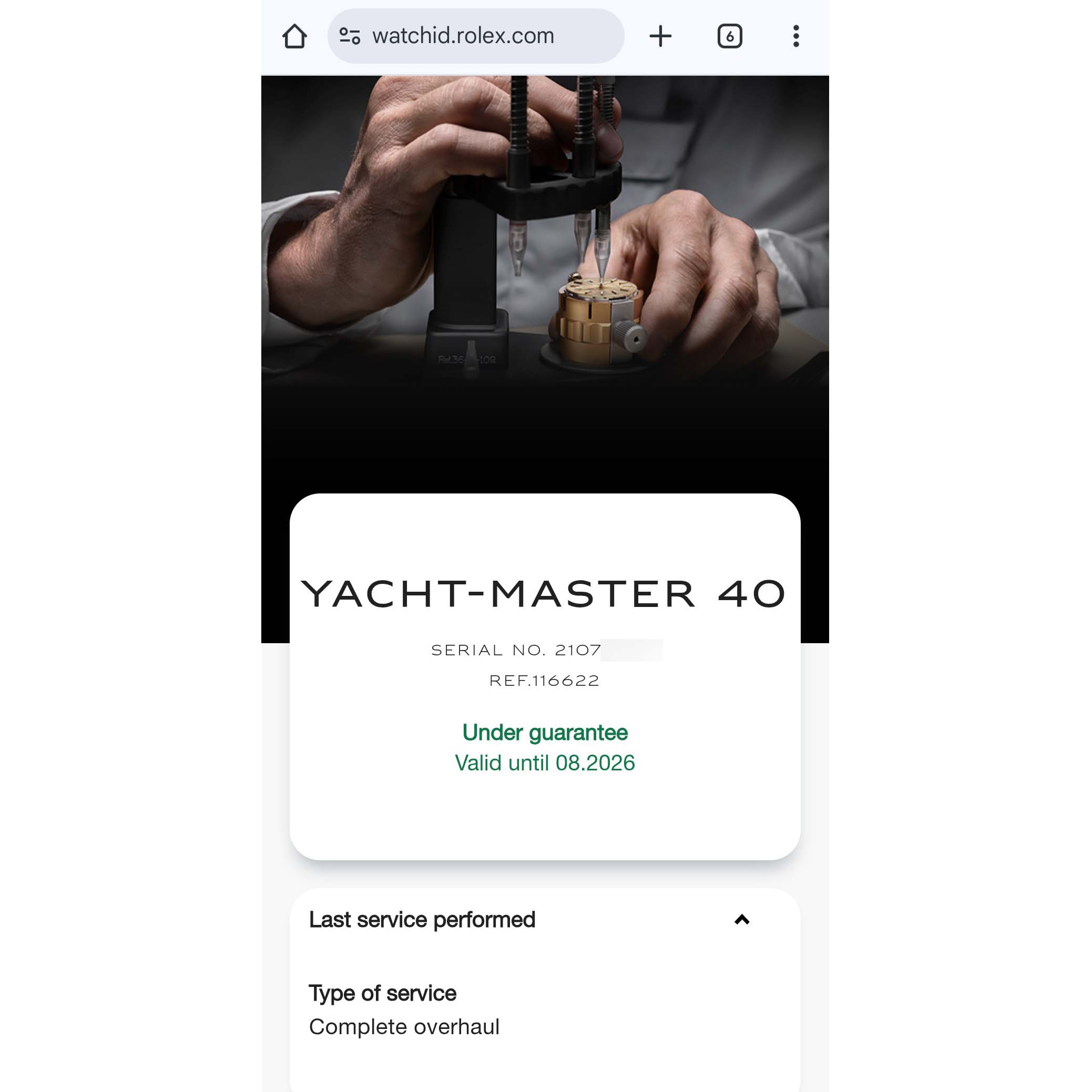 The image shows a watchmaker working on a Rolex Yacht-Master 116622 Men's Stainless Steel Blue Dial, focusing on the internal components.