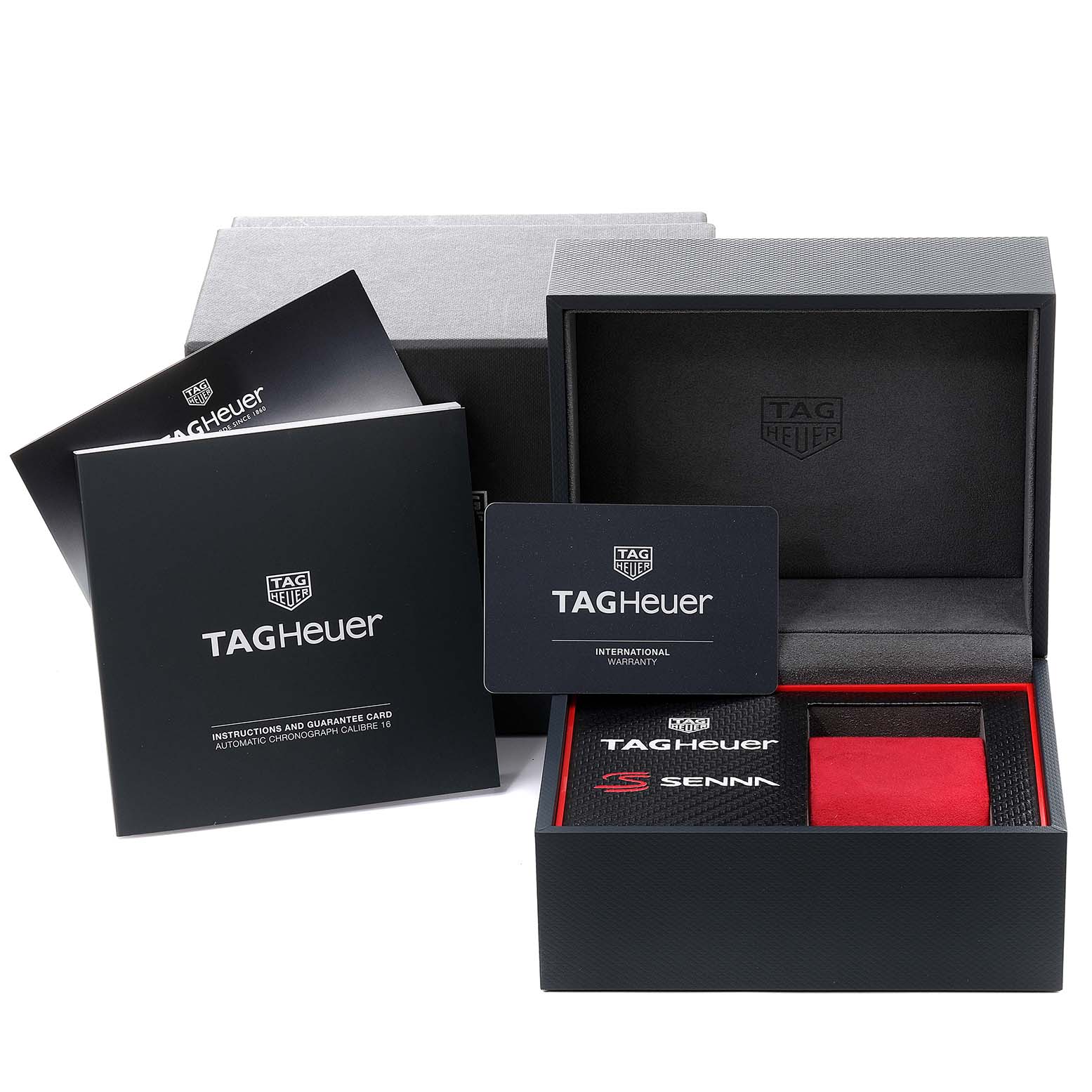 The image shows the packaging and accessories of a Tag Heuer Formula 1 CAZ2017.BA0647 Men's Stainless Steel Grey Dial CAZ2017.BA0647 Men's Stainless Steel Grey Dial watch, including boxes, booklets, and warranty cards.