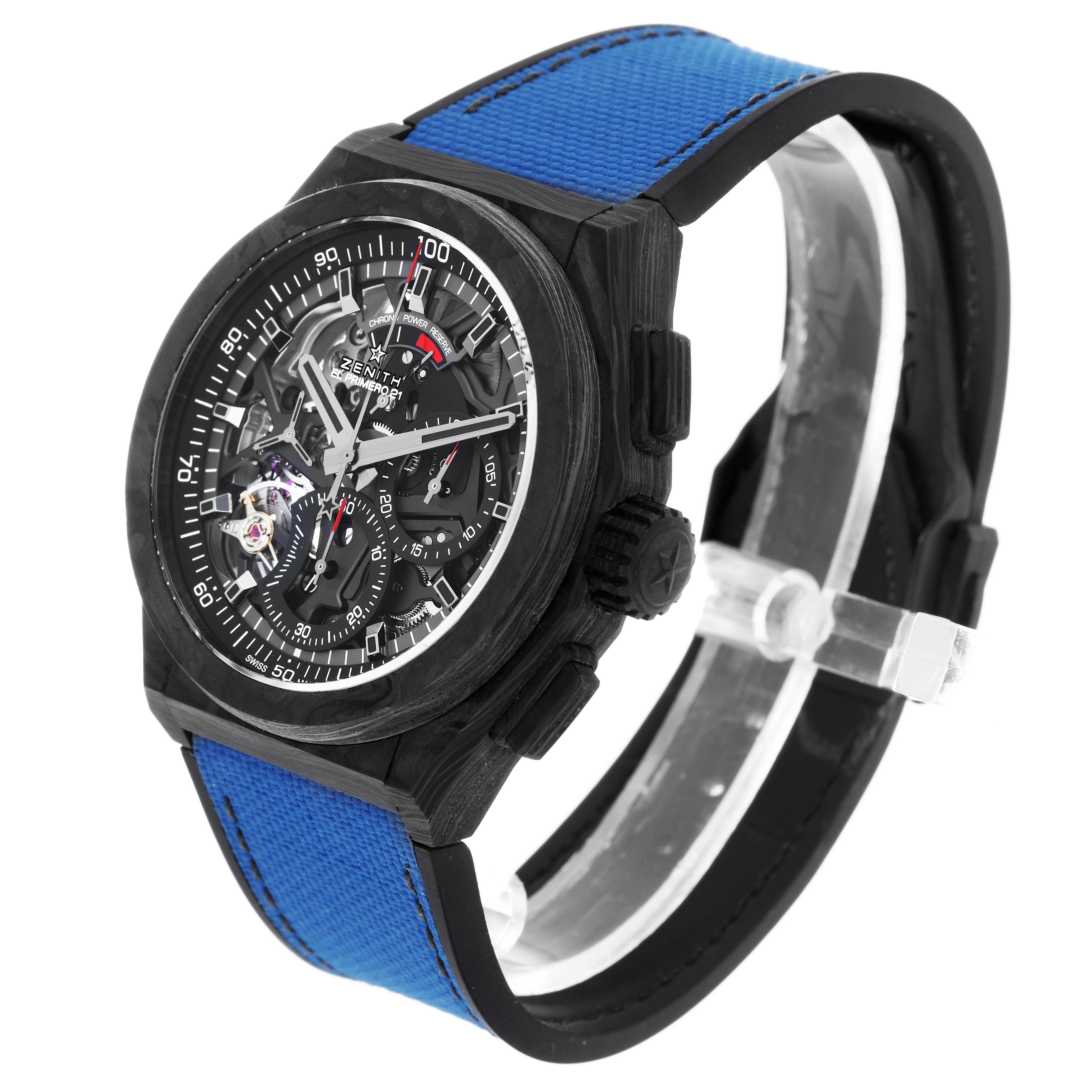 The Zenith Defy 10.9000.9004 Men's Titanium Blue Dial watch is shown at a slightly tilted angle highlighting the face, bezel, crown, and blue strap.