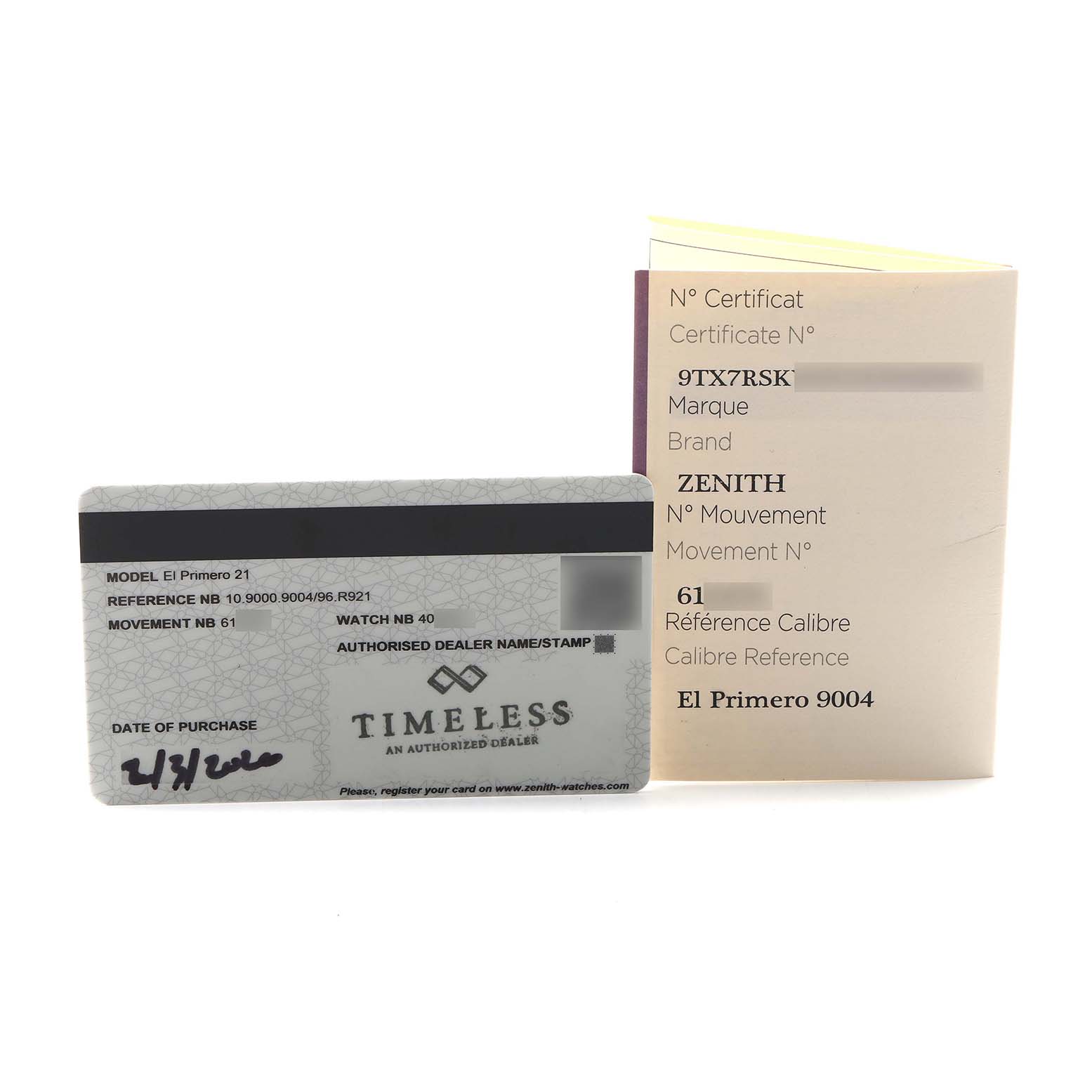 The image shows a Zenith Defy 10.9000.9004 Men's Titanium Blue Dial model warranty card and certificate booklet, viewed from above.