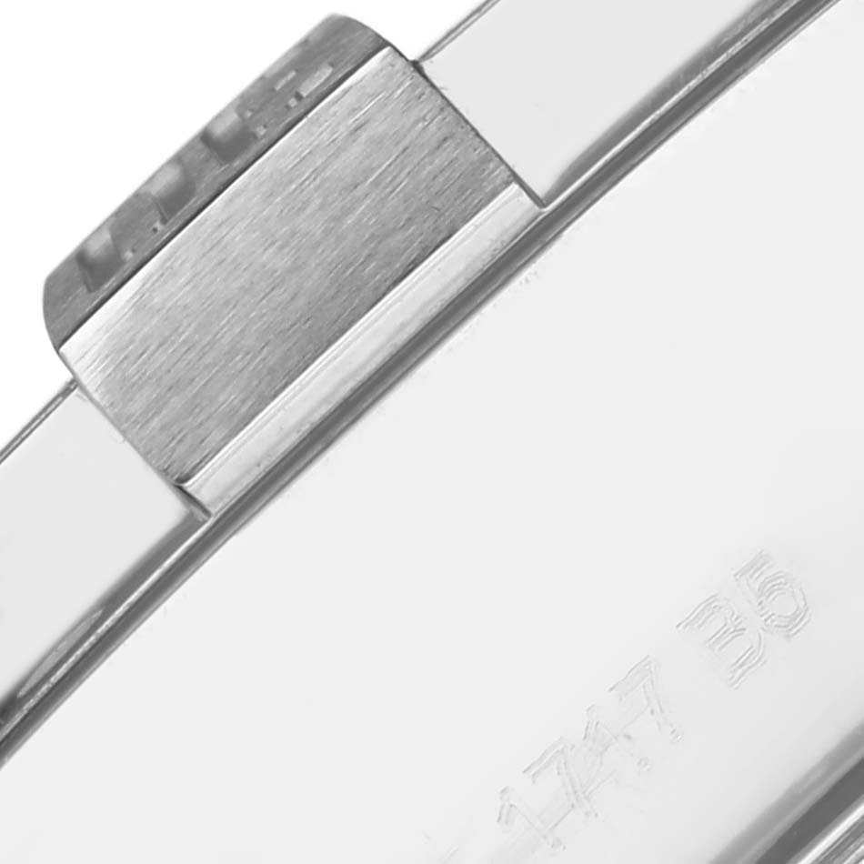 The image shows a close-up of the clasp and metal links of a Breitling Avenger A1337111/BC29 Men's Stainless Steel Black Dial A1337111/BC29 Men's Stainless Steel Black Dial watch bracelet.