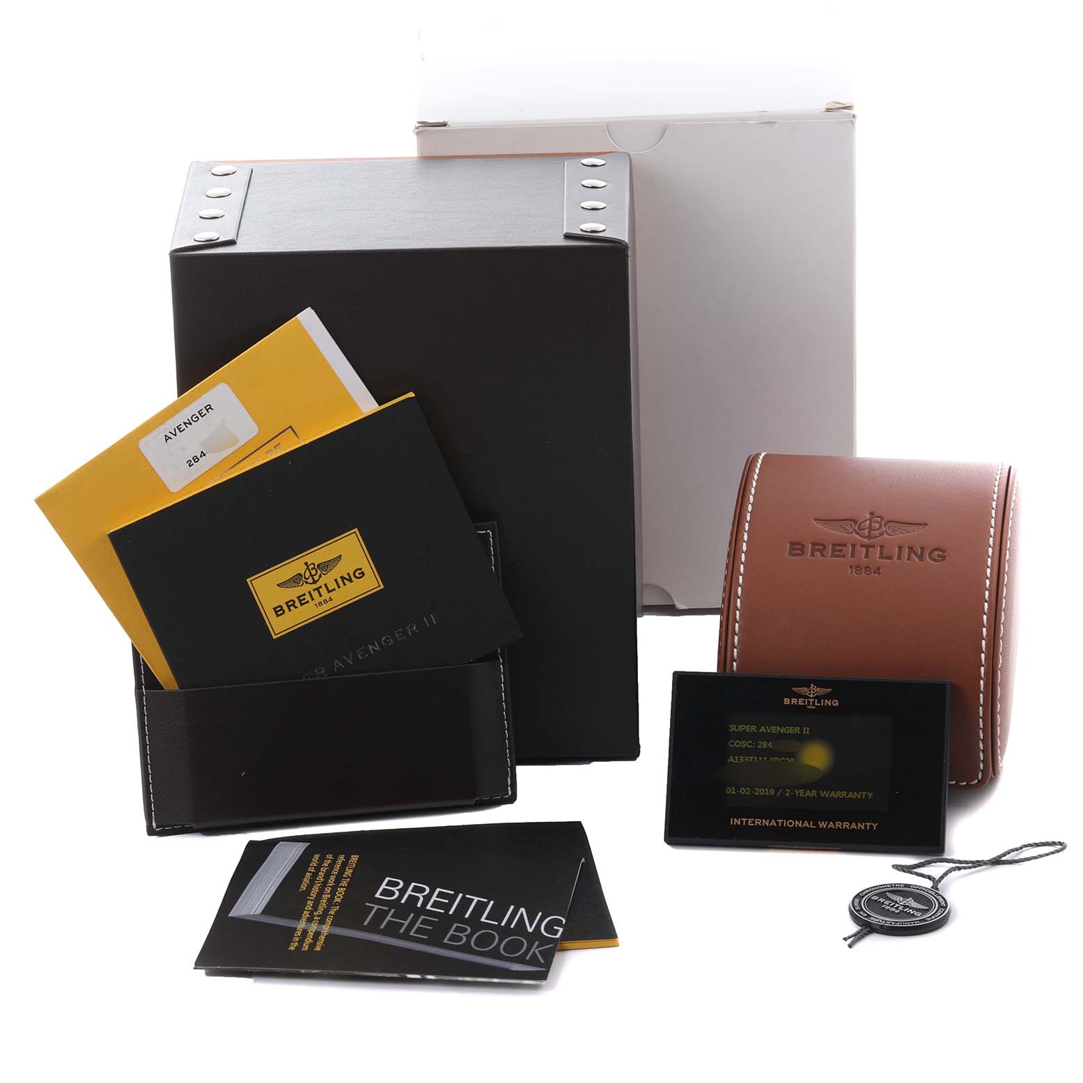 The image shows the Breitling Avenger A1337111/BC29 Men's Stainless Steel Black Dial A1337111/BC29 Men's Stainless Steel Black Dial watch packaging and accessories, including boxes, booklets, and warranty card.