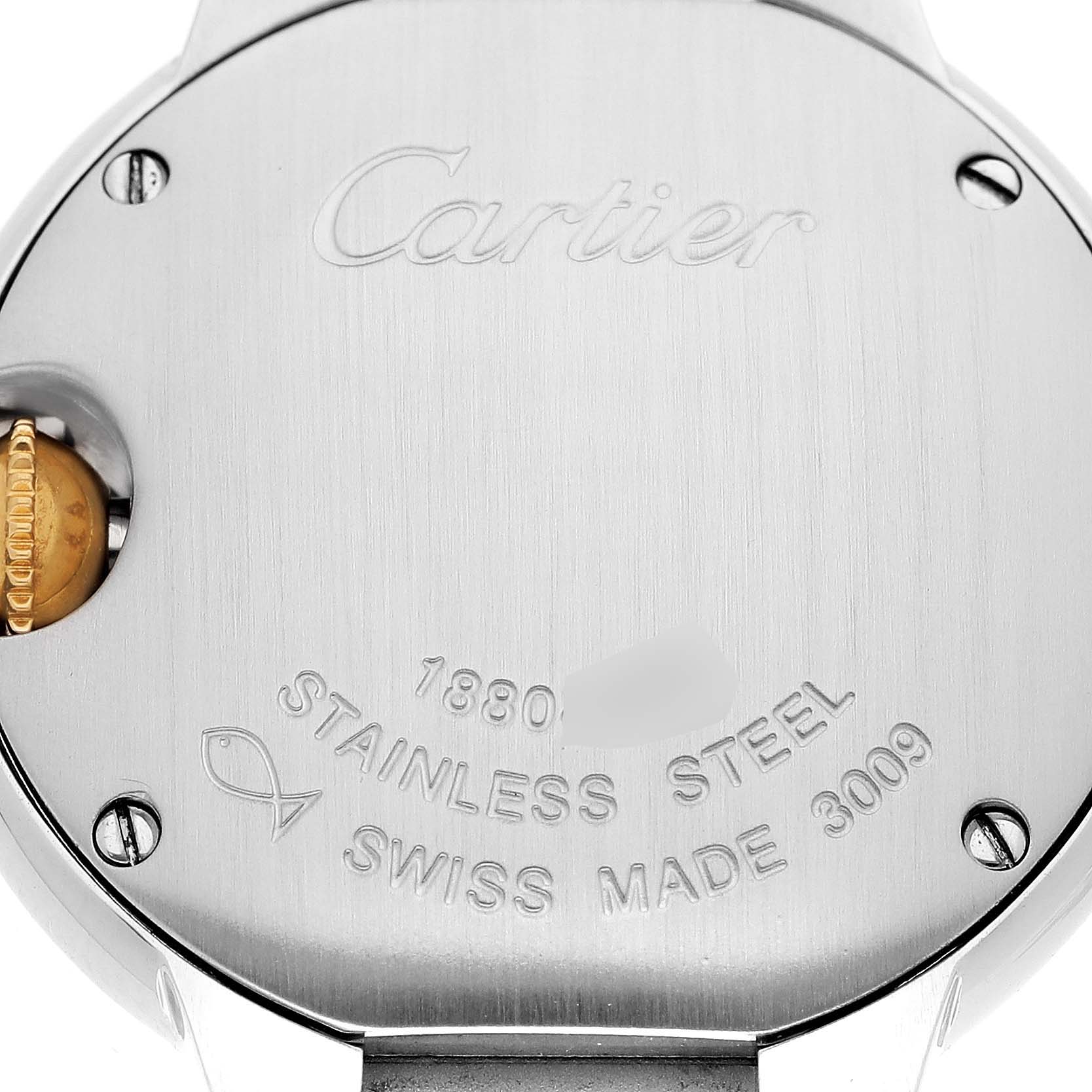 The image shows the back case of a Ballon Bleu watch by Cartier, highlighting the brand engraving and details.