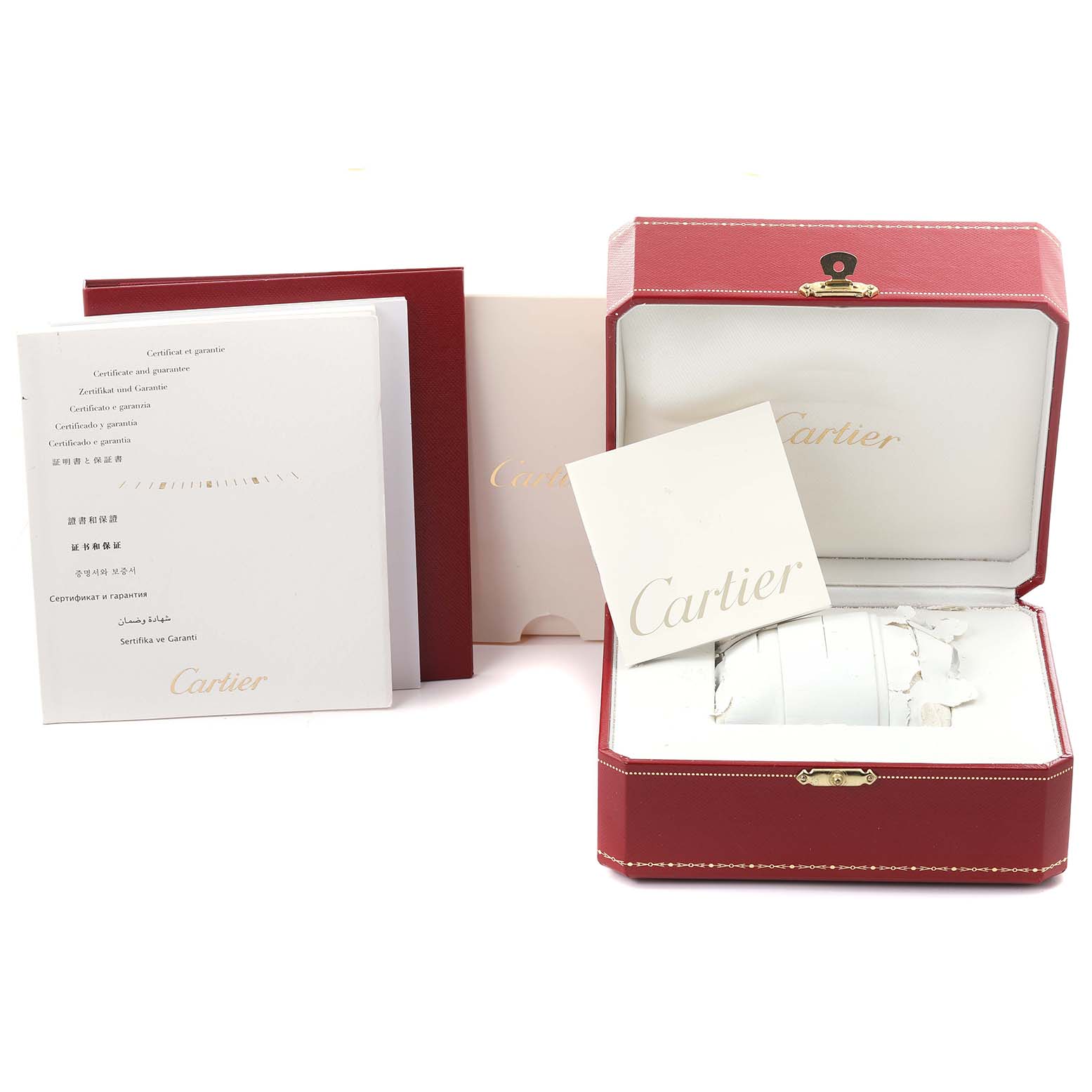 The image shows the packaging and documents for a Cartier Ballon Bleu WE902074 Women
s Stainless Steel Silver Dial WE902074 Women
s Stainless Steel Silver Dial watch, including a red box and warranty cards.
