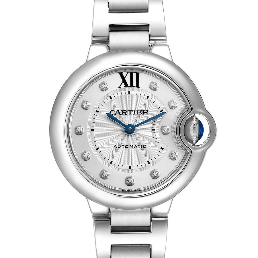 The Cartier Ballon Bleu watch is shown from a front angle, displaying the face, crown, and bracelet top.