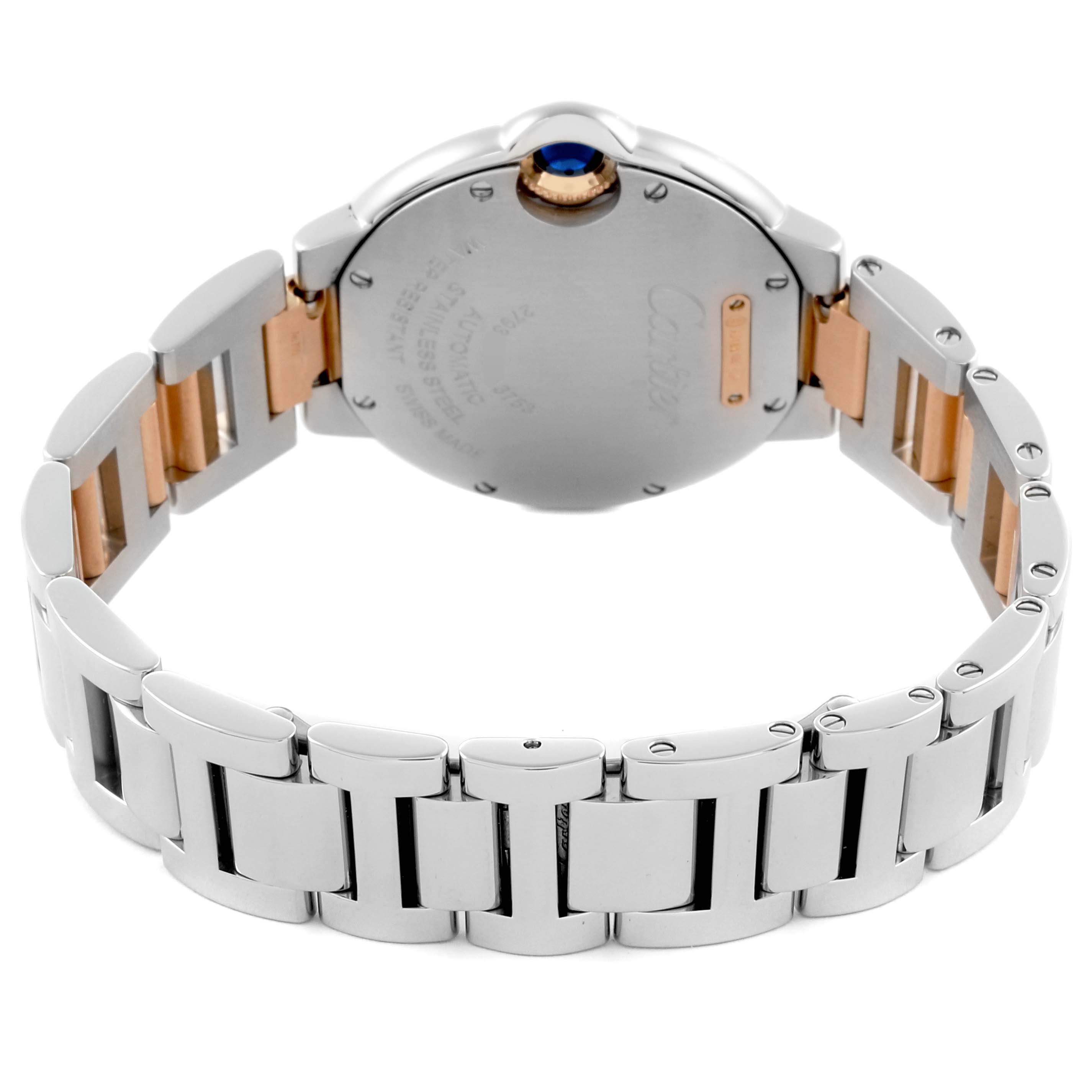 The Cartier Ballon Bleu WE902077 Women
s Steel and Gold (two tone) Silver Dial WE902077 Women
s Steel and Gold (two tone) Silver Dial watch is shown from the back, highlighting the case, crown, and metal bracelet.