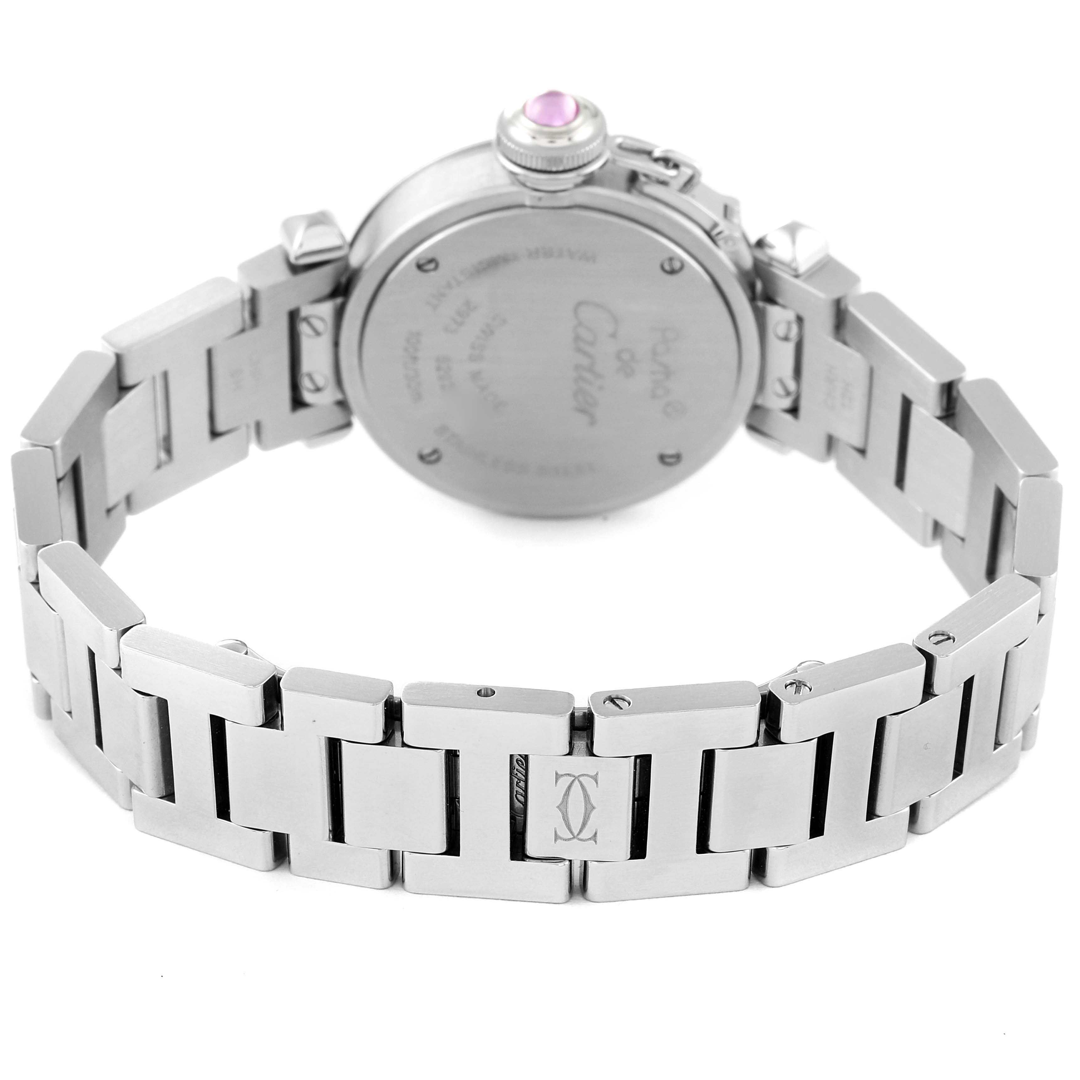 The image shows the backside of the Cartier Pasha W3140008 Women's Stainless Steel Pink Dial W3140008 Women's Stainless Steel Pink Dial watch, highlighting its stainless steel bracelet and case back.