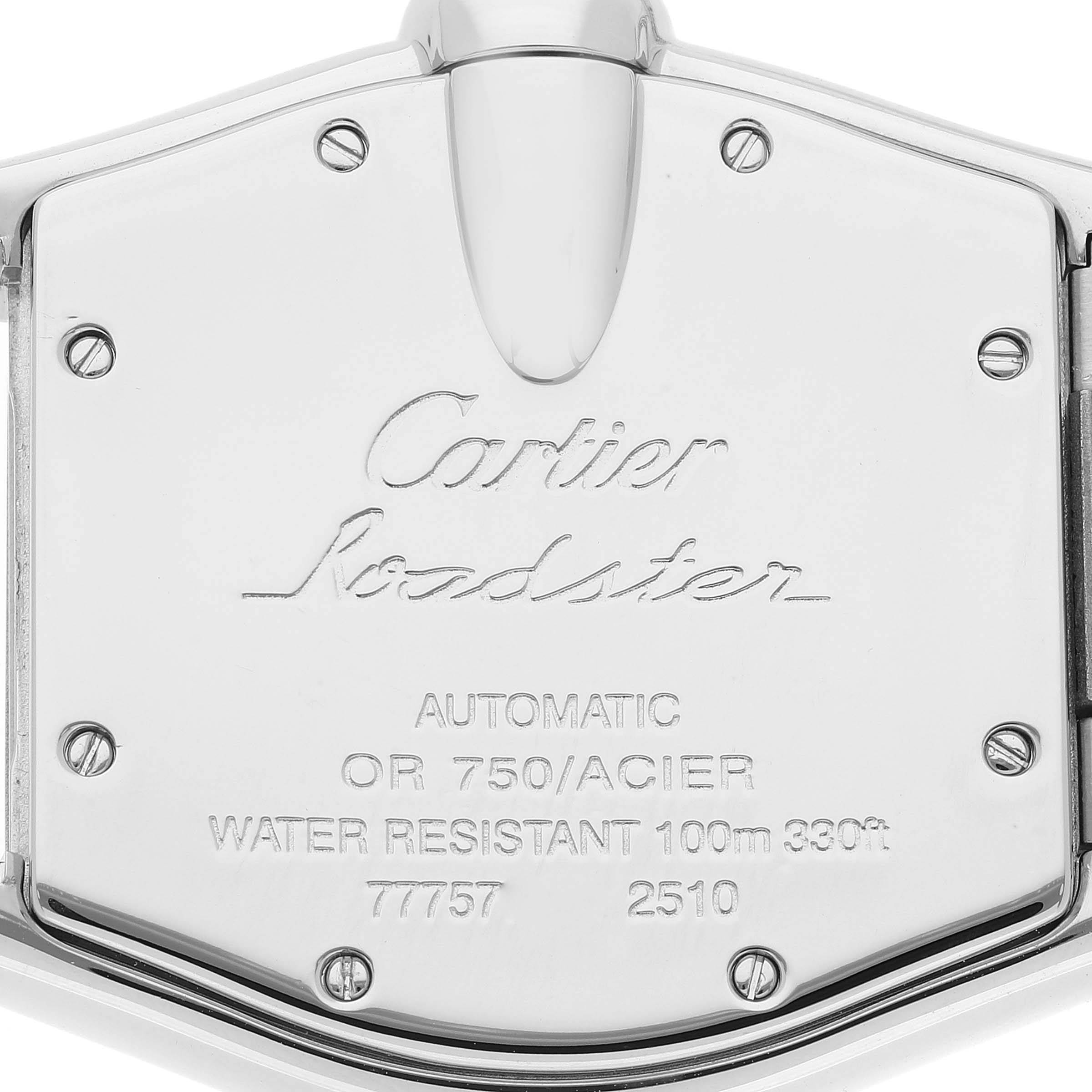 The image shows the back case of a Cartier Roadster W62031Y4 Men's Steel and Gold (two tone) Silver Dial W62031Y4 Men's Steel and Gold (two tone) Silver Dial watch with engravings detailing model information.