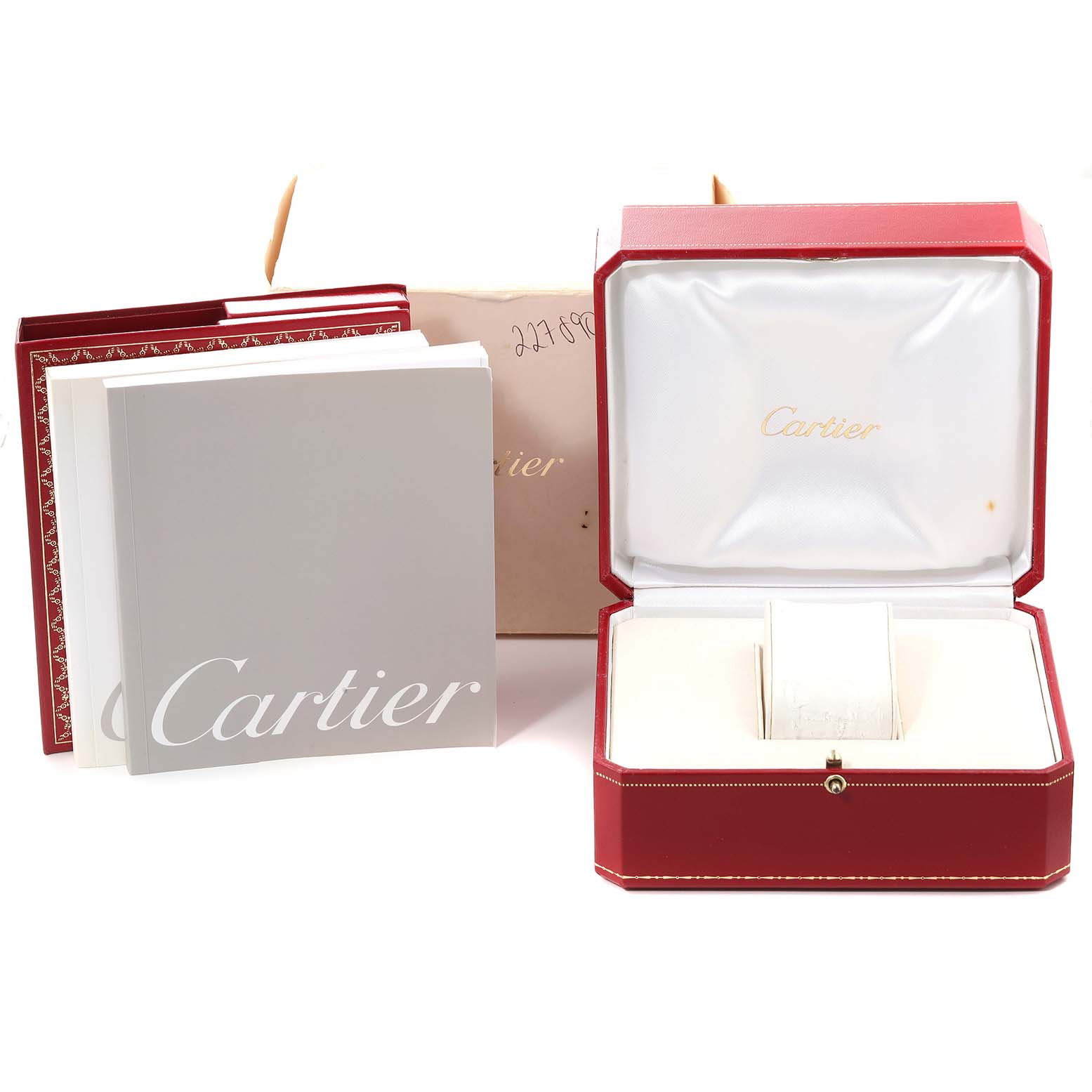 This image shows the box, packaging, and manuals for a Cartier Santos W20055D6 Men
s Stainless Steel Silver Dial W20055D6 Men
s Stainless Steel Silver Dial watch.