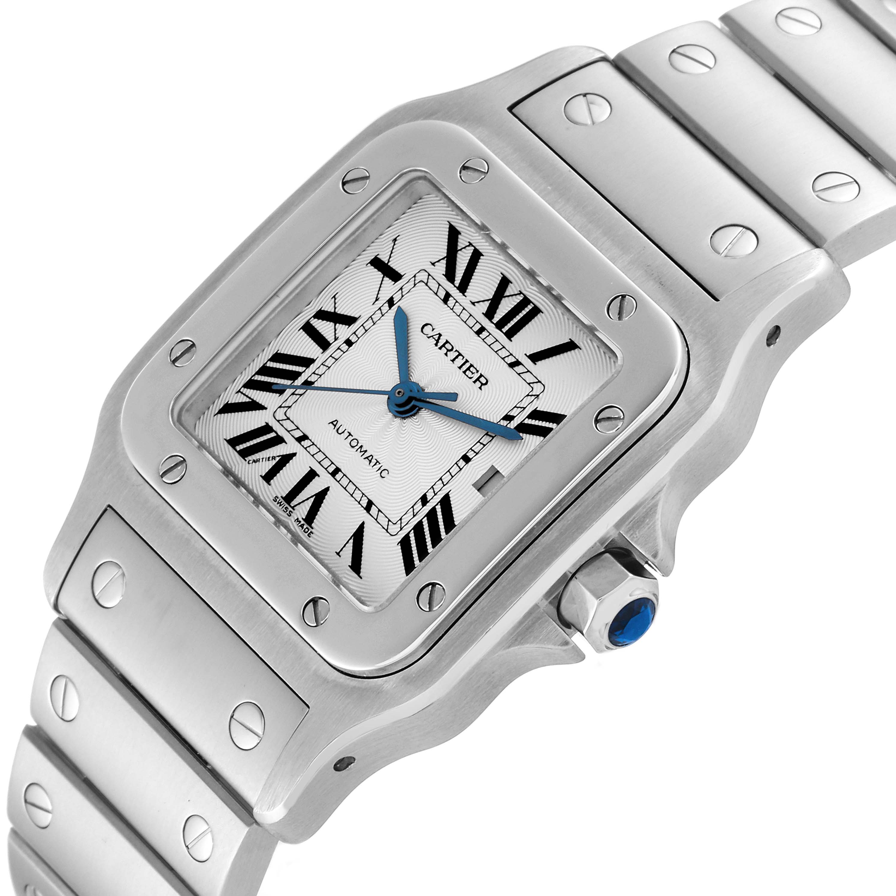 This image shows a close-up of the Cartier Santos W20055D6 Men
s Stainless Steel Silver Dial W20055D6 Men
s Stainless Steel Silver Dial watch, highlighting the face, bezel, crown, and part of the bracelet.