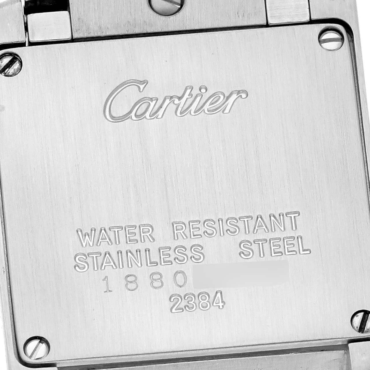 The image shows the back case of a Cartier Tank Francaise W51007Q4 Women's Steel and Gold (two tone) Silver Dial W51007Q4 Women's Steel and Gold (two tone) Silver Dial watch with engravings.