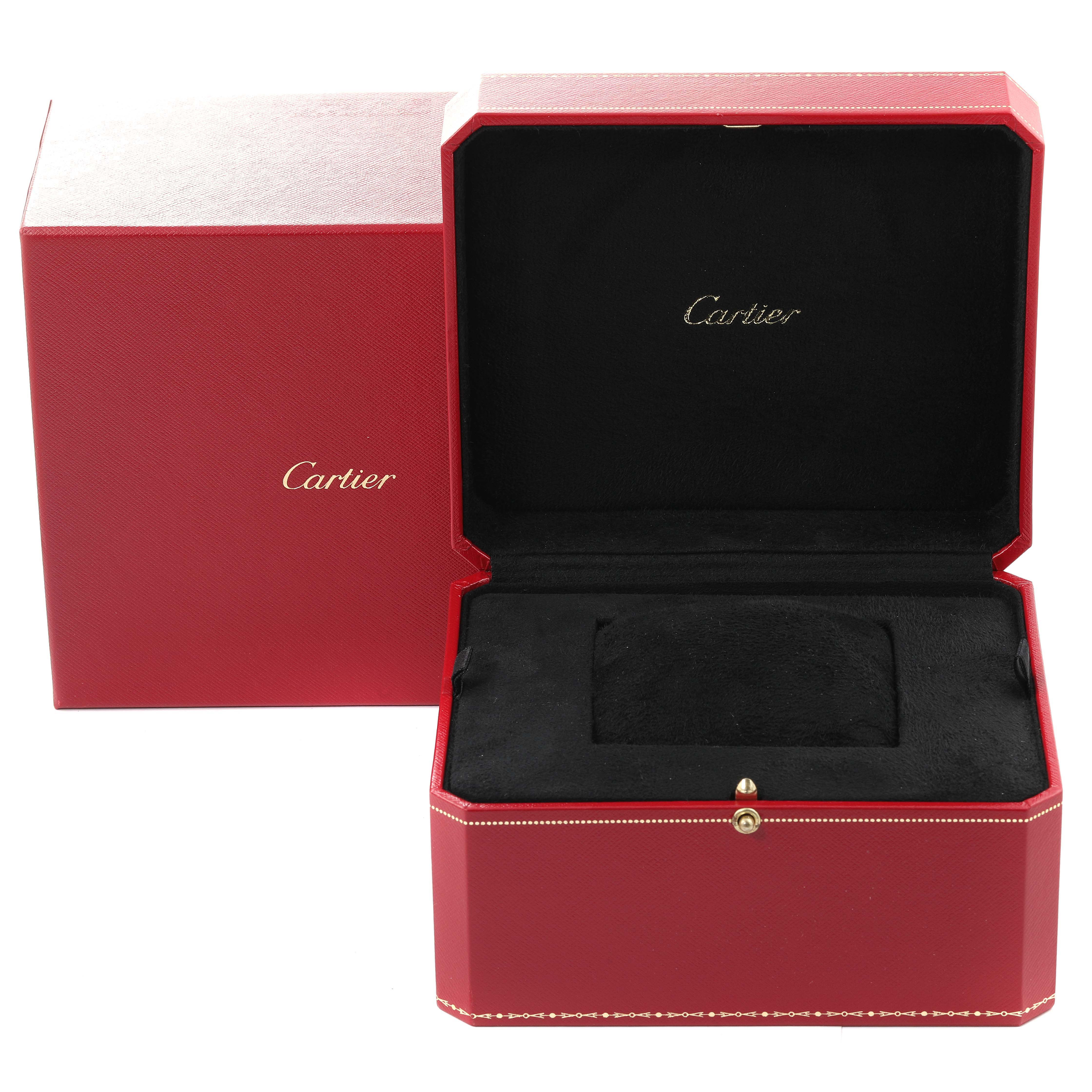 The image shows an open red Cartier watch box for the Tank Francaise model, with the brand name inside.