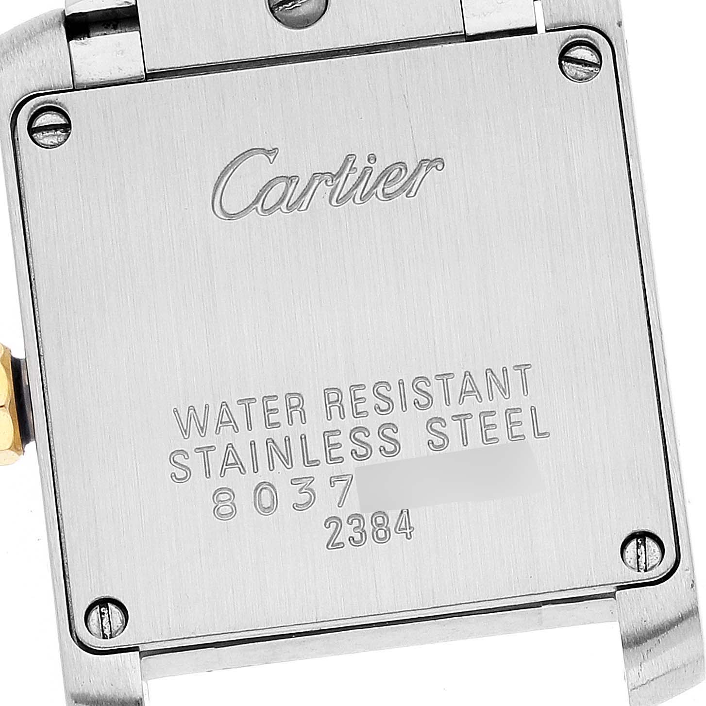 This image shows the back case of a Tank Francaise model by Cartier, highlighting its water resistance and stainless steel construction.