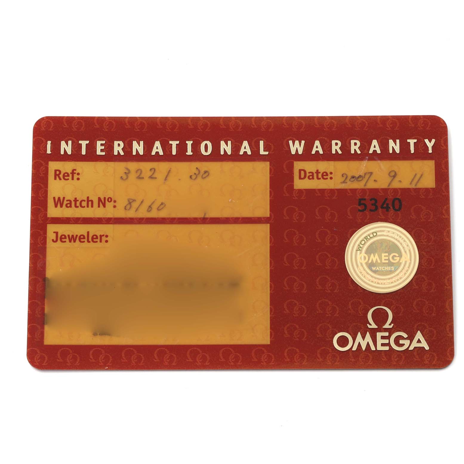 The image shows an Omega Speedmaster 3221.30.00 Men
s Stainless Steel Silver Dial 3221.30.00 Men
s Stainless Steel Silver Dial International Warranty card, displaying reference numbers, date, and a hologram seal.