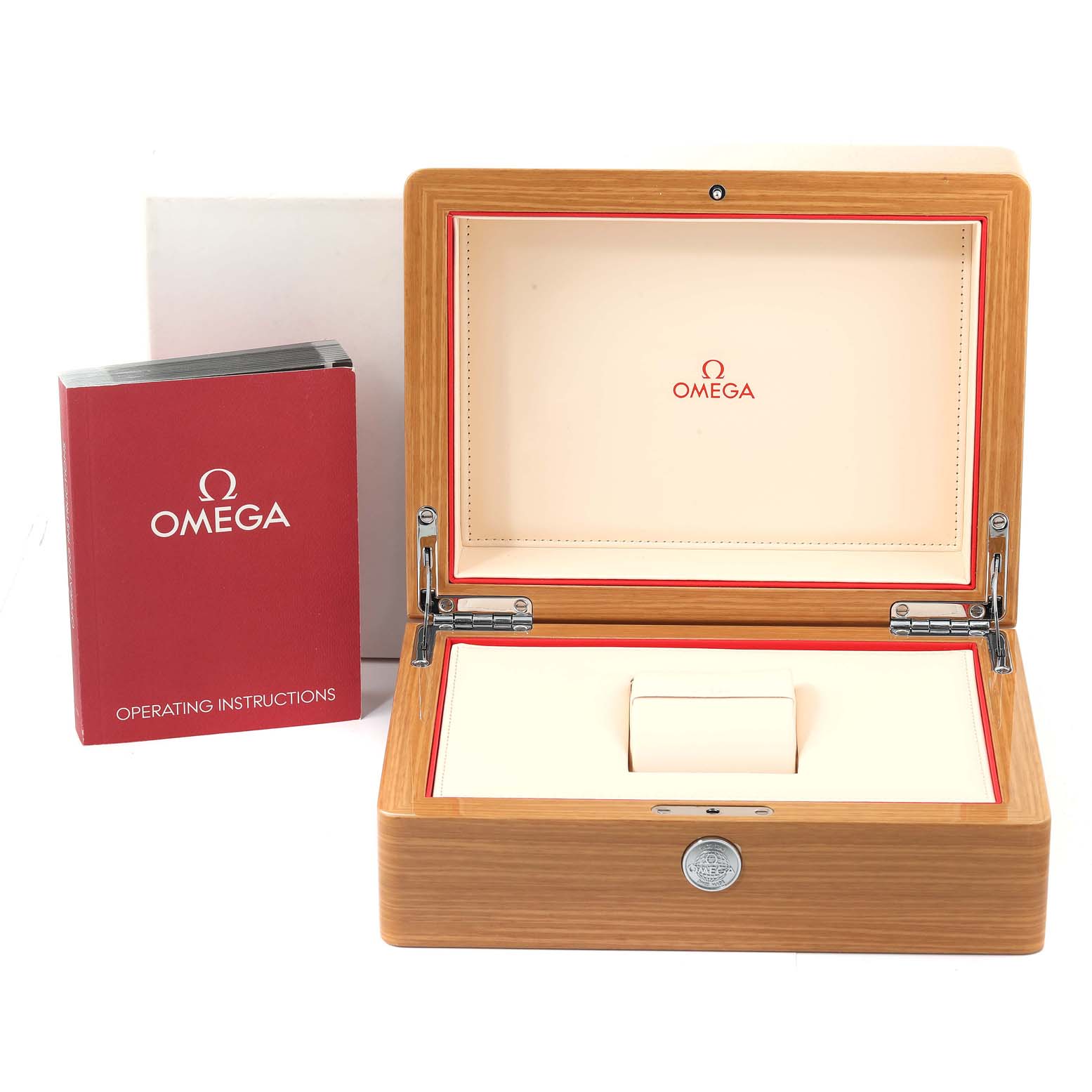 An Omega Speedmaster 329.30.44.51.04.001 Men's Stainless Steel White Dial 329.30.44.51.04.001 Men's Stainless Steel White Dial watch box is open and displayed alongside the operating instructions booklet.