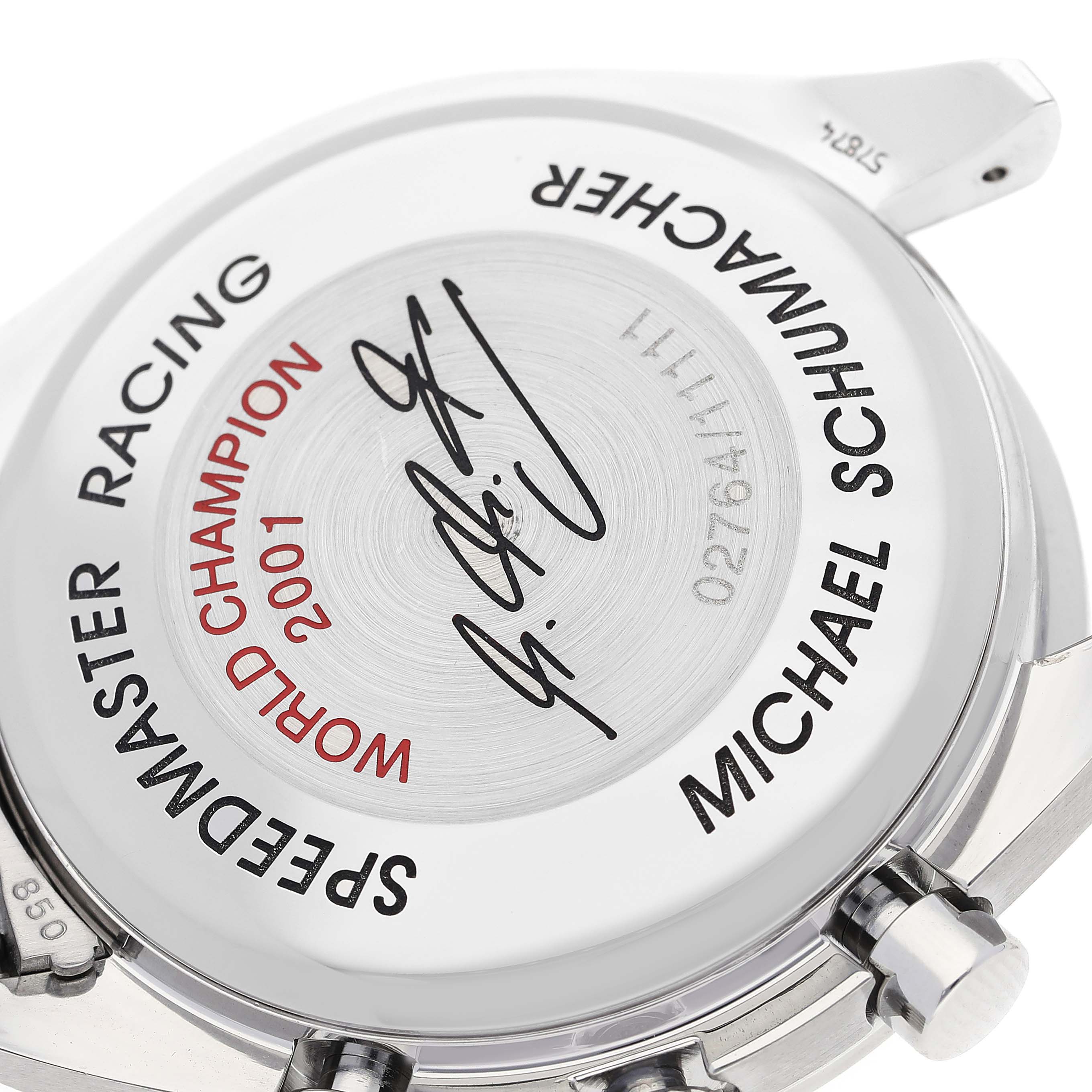 The image shows the case back of an Omega Speedmaster 3519.50.00 Men's Stainless Steel Black Dial 3519.50.00 Men's Stainless Steel Black Dial Racing watch, featuring an engraving and signature.