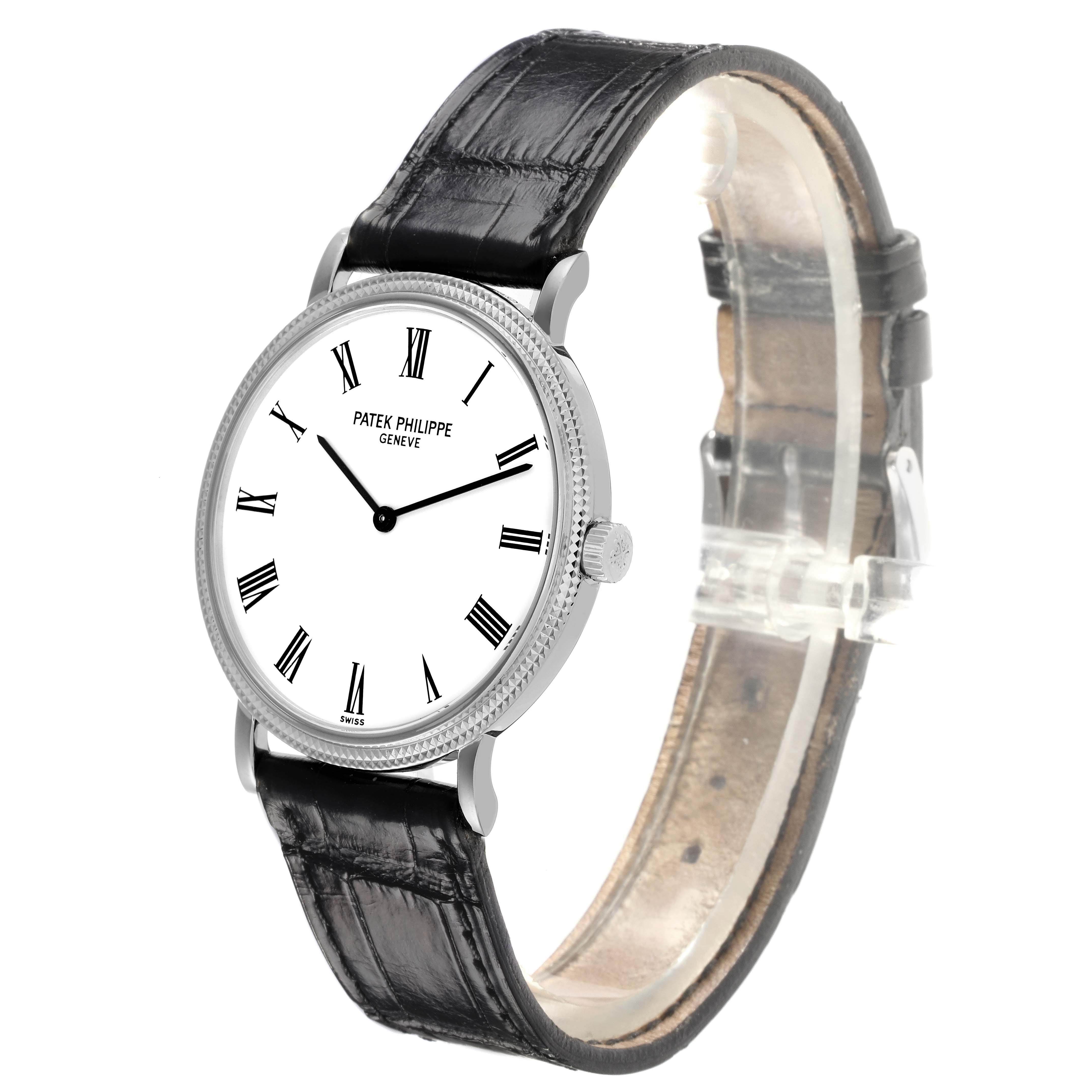 The Patek Philippe Calatrava 5120G Men's White Gold White Dial 5120G Men's White Gold White Dial watch is shown from a side angle, displaying the dial, bezel, and leather strap.
