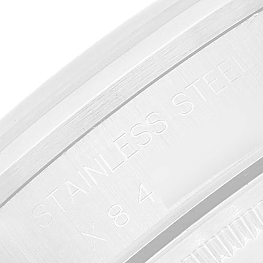 This image shows a close-up of the stainless steel case back of the Rolex Air-King 14000 Men's Stainless Steel Silver Dial 14000 Men's Stainless Steel Silver Dial watch.