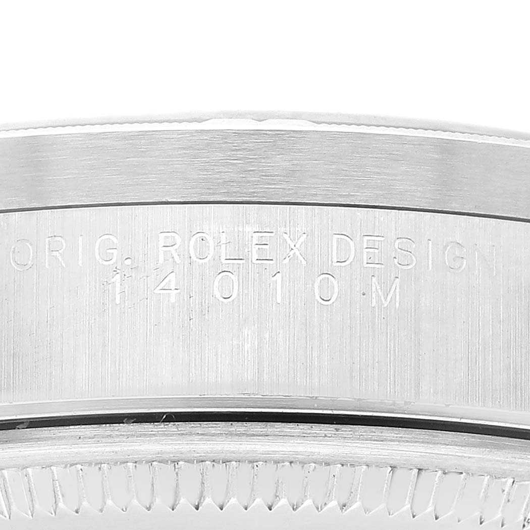 The image shows a close-up of the side of the Rolex Air-King 14010M Men's Stainless Steel Black Dial 14010M Men's Stainless Steel Black Dial watch, focusing on the engraved model number "14010M."