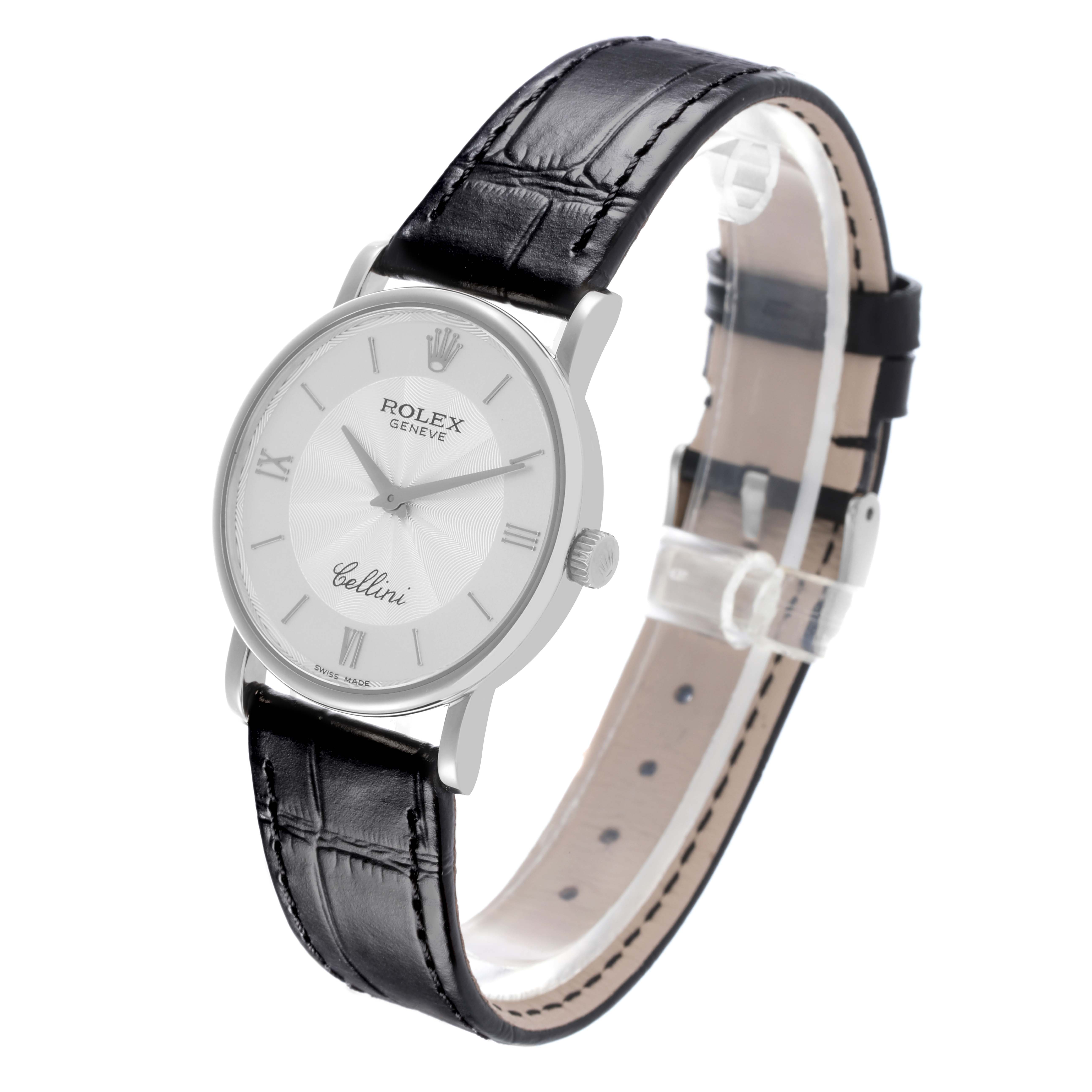 The Rolex Cellini 5115/9 Men
s White Gold Silver Dial 5115/9 Men
s White Gold Silver Dial watch is shown at a slight angle highlighting the face, case, crown, and black leather strap.