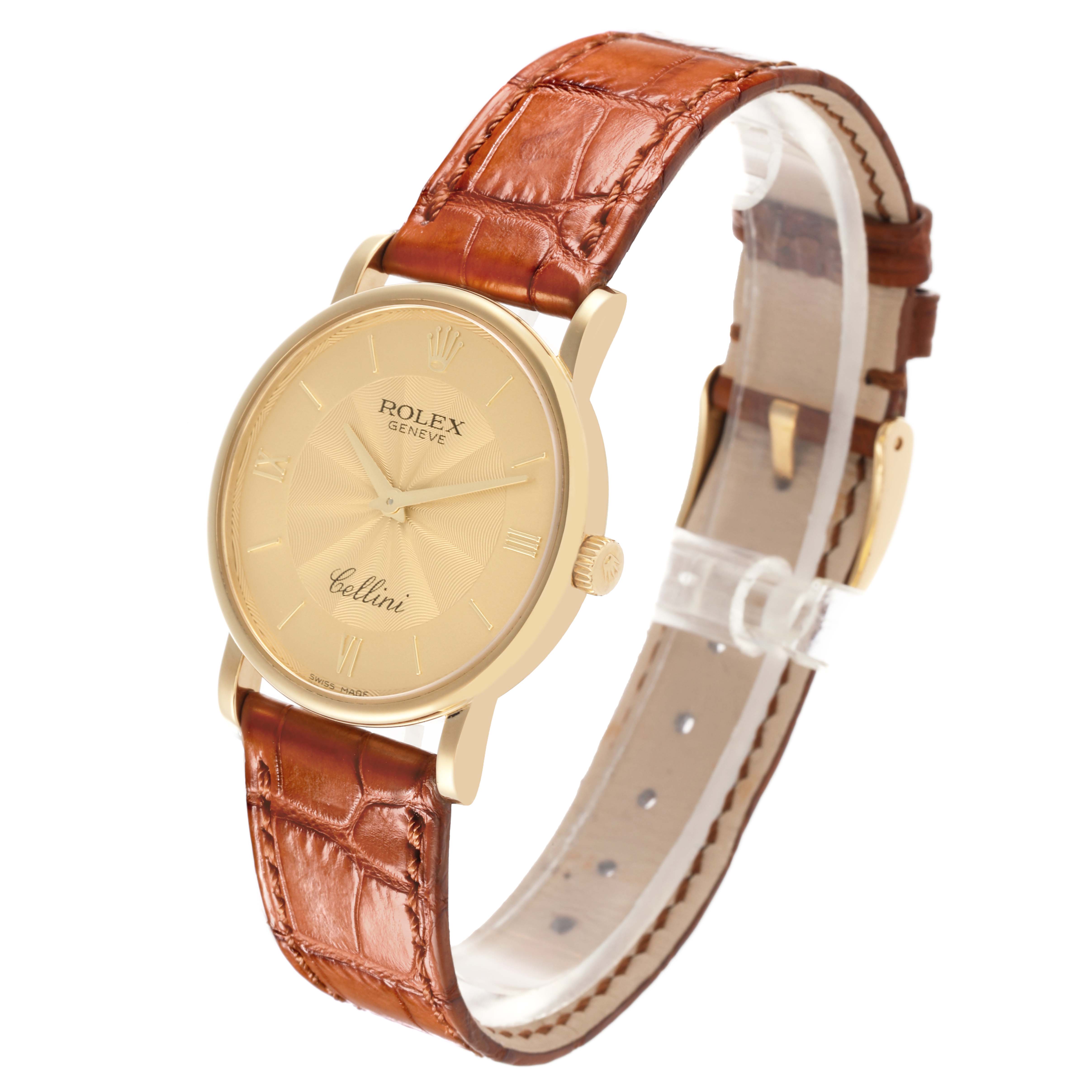 The Rolex Cellini 5115 Men's Yellow Gold Champagne Dial 5115 Men's Yellow Gold Champagne Dial watch is shown at an angled side view, displaying the face, crown, and brown leather strap.