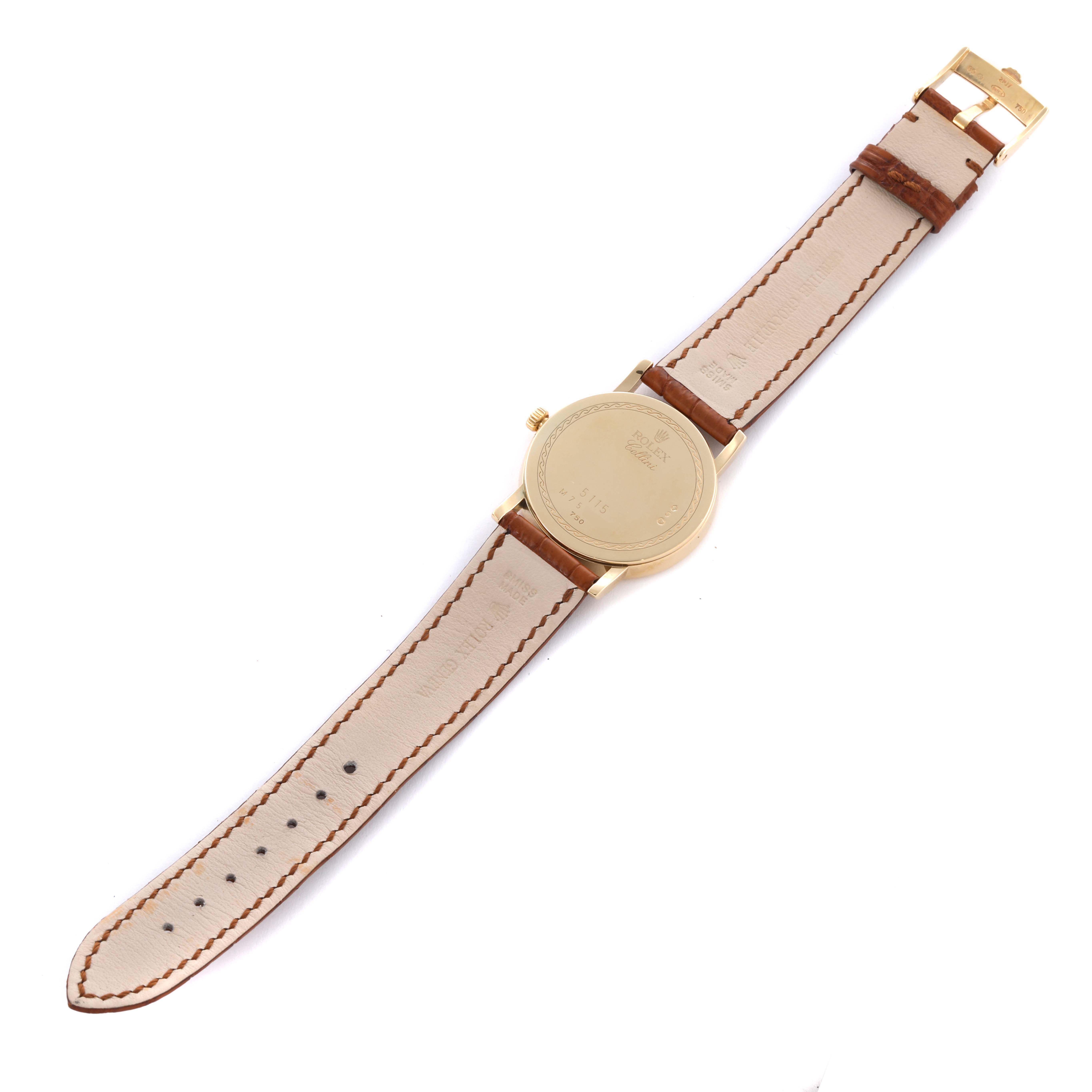 The Rolex Cellini 5115 Men's Yellow Gold Champagne Dial 5115 Men's Yellow Gold Champagne Dial watch is shown from the back, displaying the case back, leather strap, and buckle.