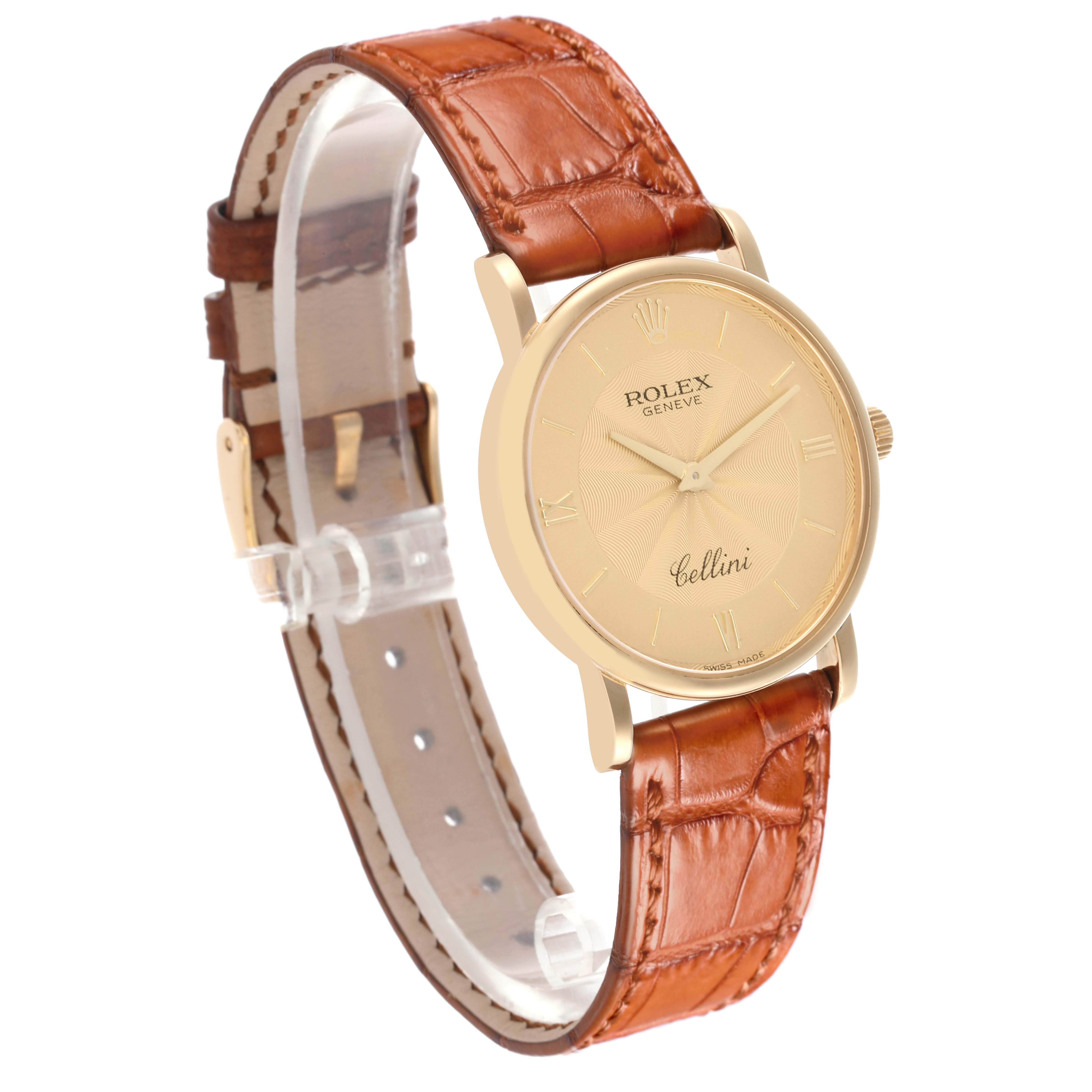 The Rolex Cellini 5115 Men's Yellow Gold Champagne Dial 5115 Men's Yellow Gold Champagne Dial watch is shown at a slight angle, featuring the full face, crown, and brown leather strap.