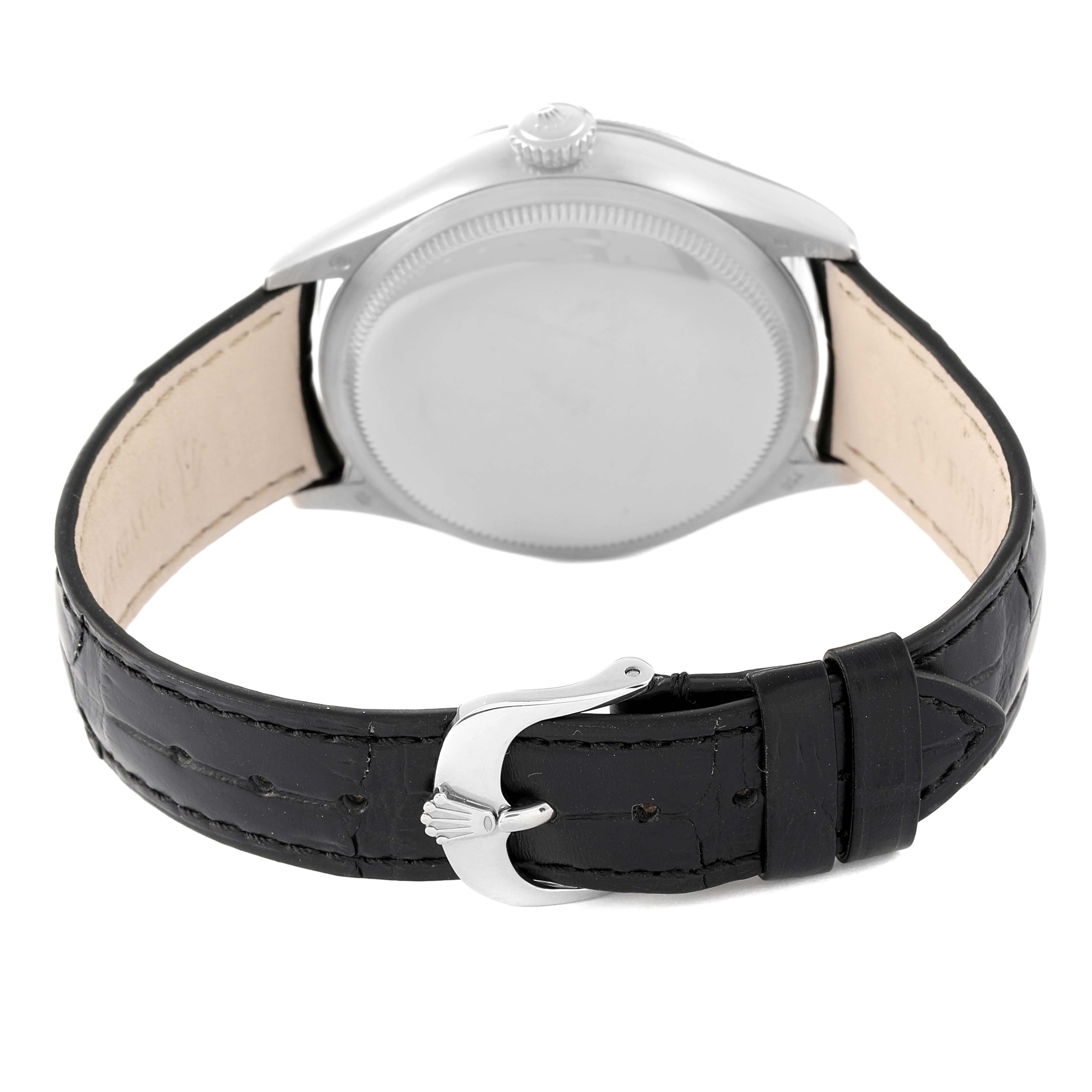 This image shows the back view of the Rolex Cellini 50529 Men
s White Gold Black Dial 50529 Men
s White Gold Black Dial watch, highlighting the case back and black leather strap with a clasp.