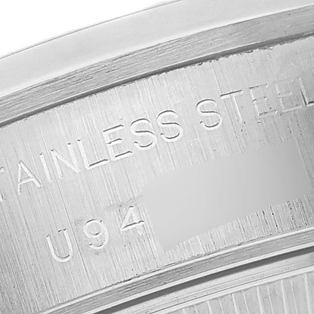The image shows a close-up angle of the stainless steel case back of a Rolex Date 69160 Women
s Stainless Steel White Dial 69160 Women
s Stainless Steel White Dial model watch.