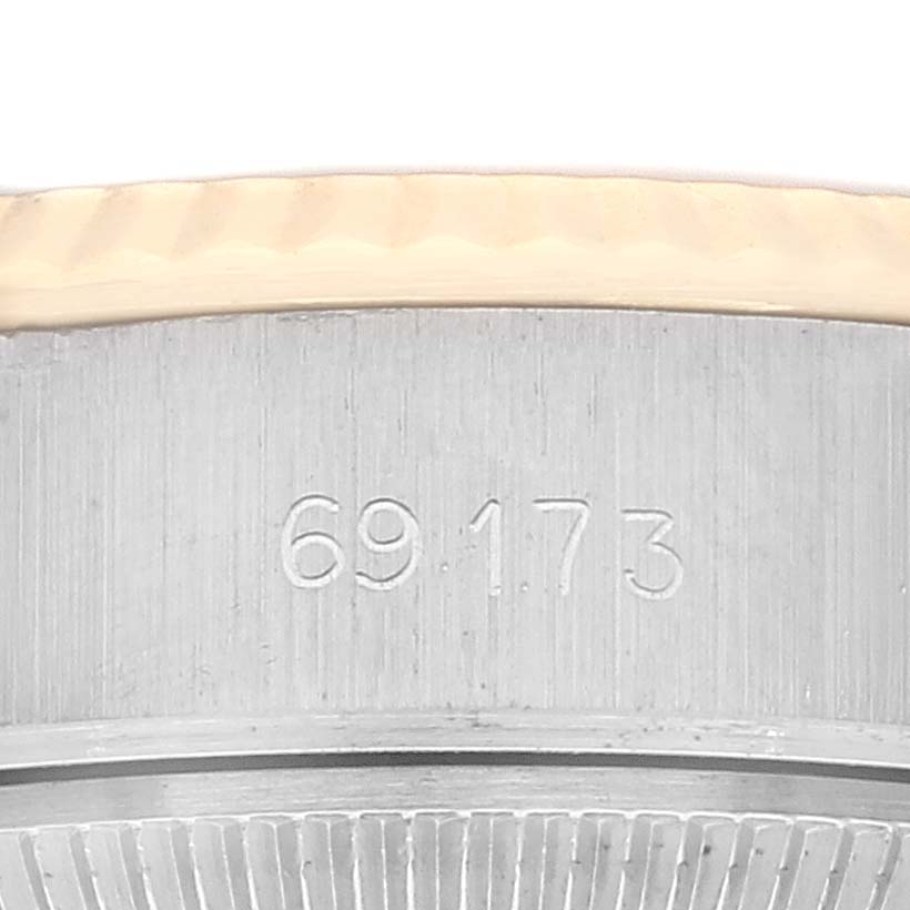 The image shows a close-up of the side of a Rolex Datejust 69173 Women's Steel and Gold (two tone) White Dial 69173 Women's Steel and Gold (two tone) White Dial watch, highlighting the engraved model number "69173."