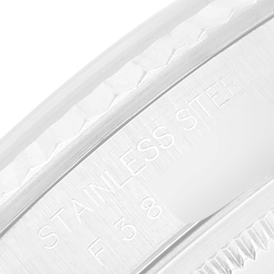 The image shows a close-up of the case side and engraved details of a Rolex Datejust 16234 Men's Stainless Steel Silver Dial 16234 Men's Stainless Steel Silver Dial model in stainless steel.