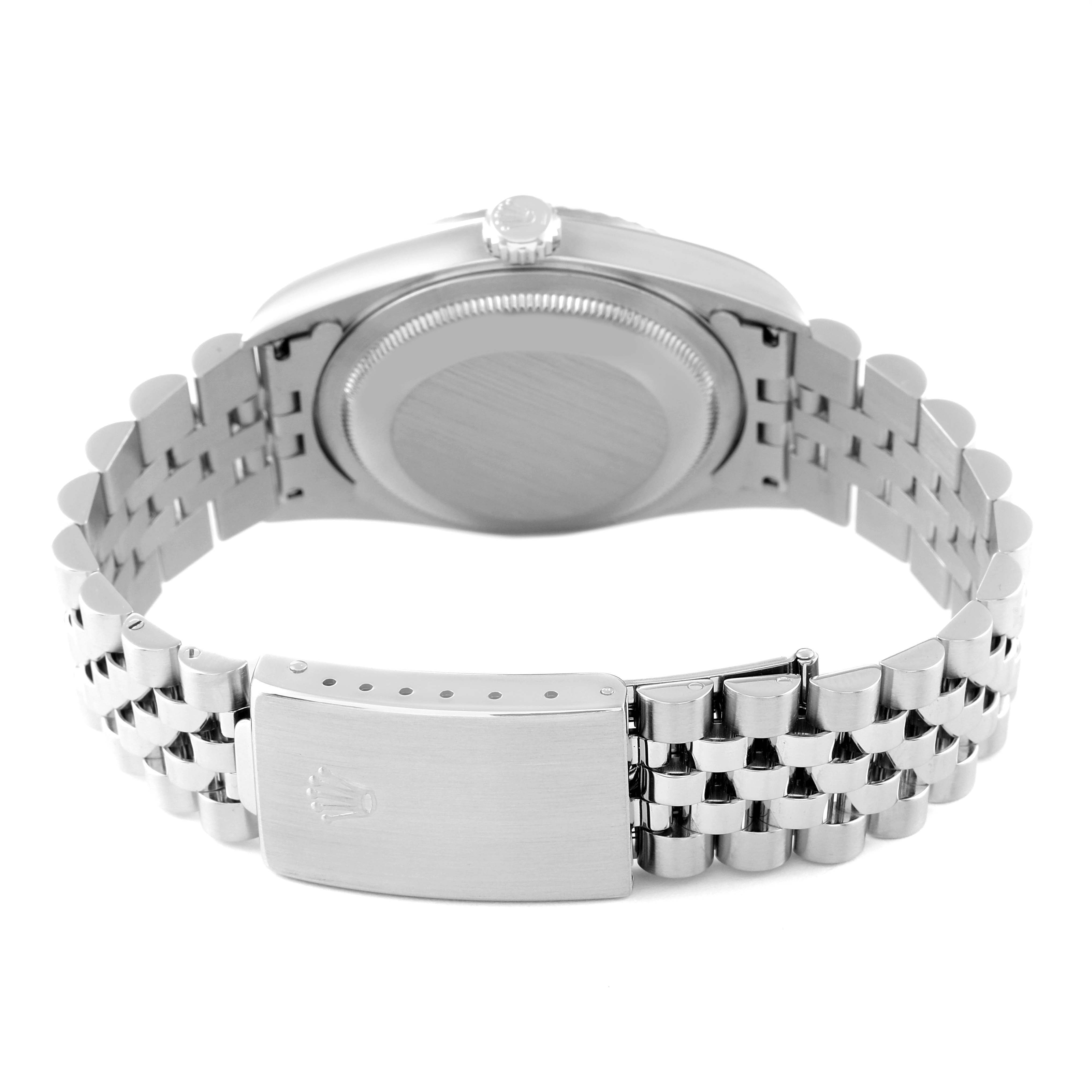 The image shows a rear view of a Rolex Datejust 16234 Men's Stainless Steel Silver Dial 16234 Men's Stainless Steel Silver Dial watch, highlighting the case back and bracelet clasp.