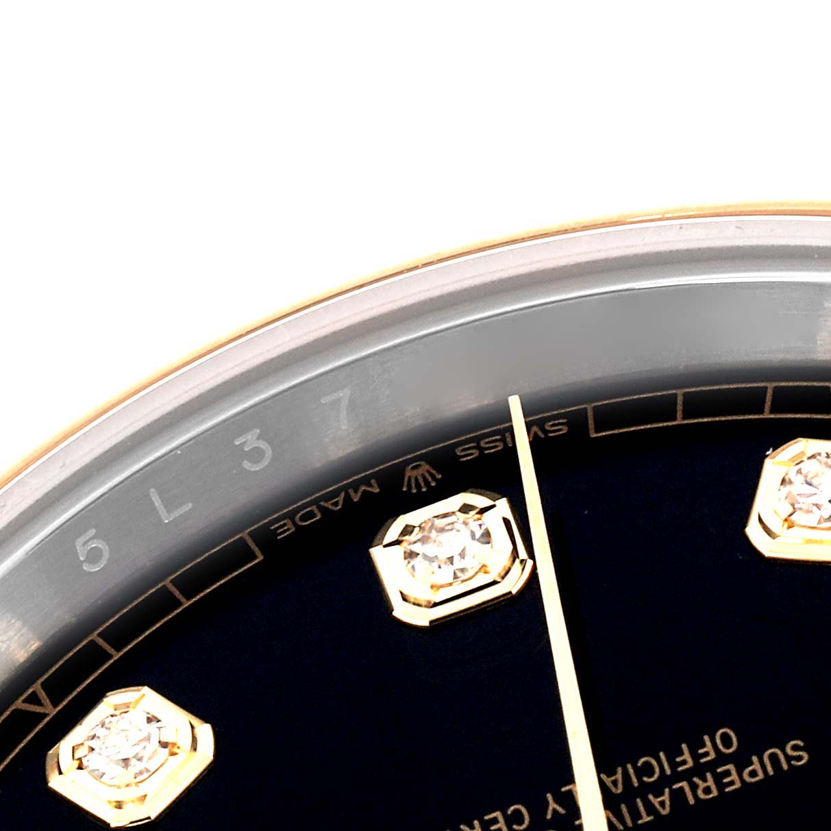 This image shows a close-up of the dial and diamond hour markers of a Rolex Datejust 41 126303 Men's Steel and Gold (two tone) Black Dial 126303 Men's Steel and Gold (two tone) Black Dial watch.