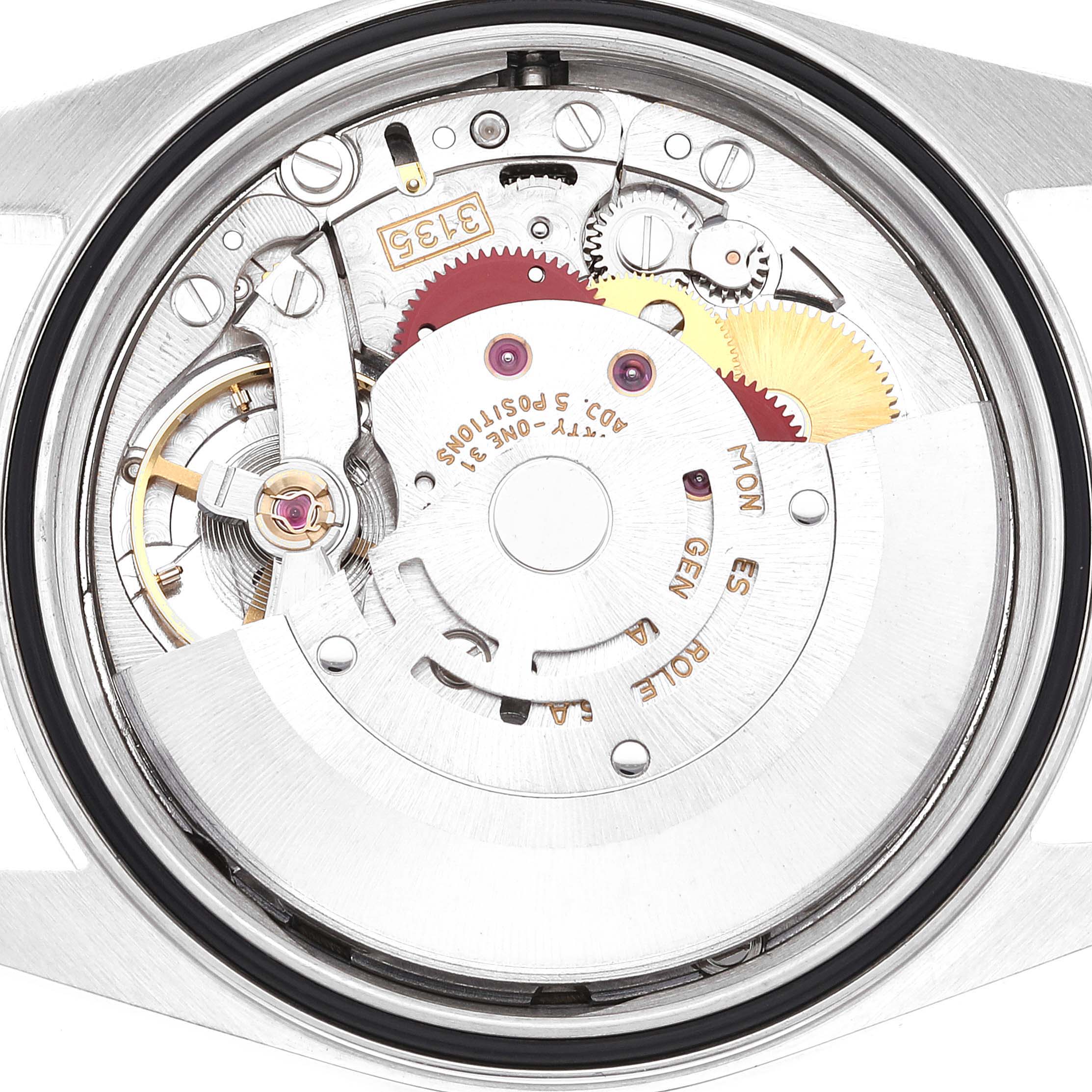 This is an interior view showing the movement mechanism of a Rolex Datejust 16220 Men's Stainless Steel Blue Dial 16220 Men's Stainless Steel Blue Dial watch.