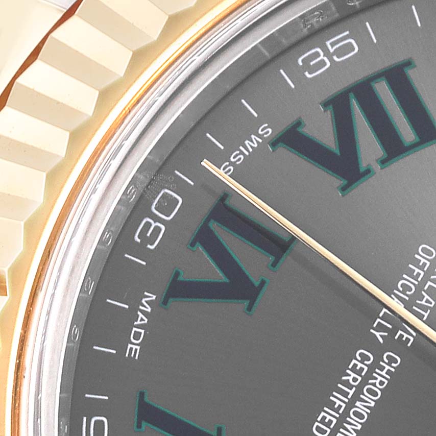 The image shows a close-up of the Rolex Datejust 41 116333 Men's Steel and Gold (two tone) Grey Dial 116333 Men's Steel and Gold (two tone) Grey Dial dial and part of the bezel, focusing on the Roman numeral and minute markers.