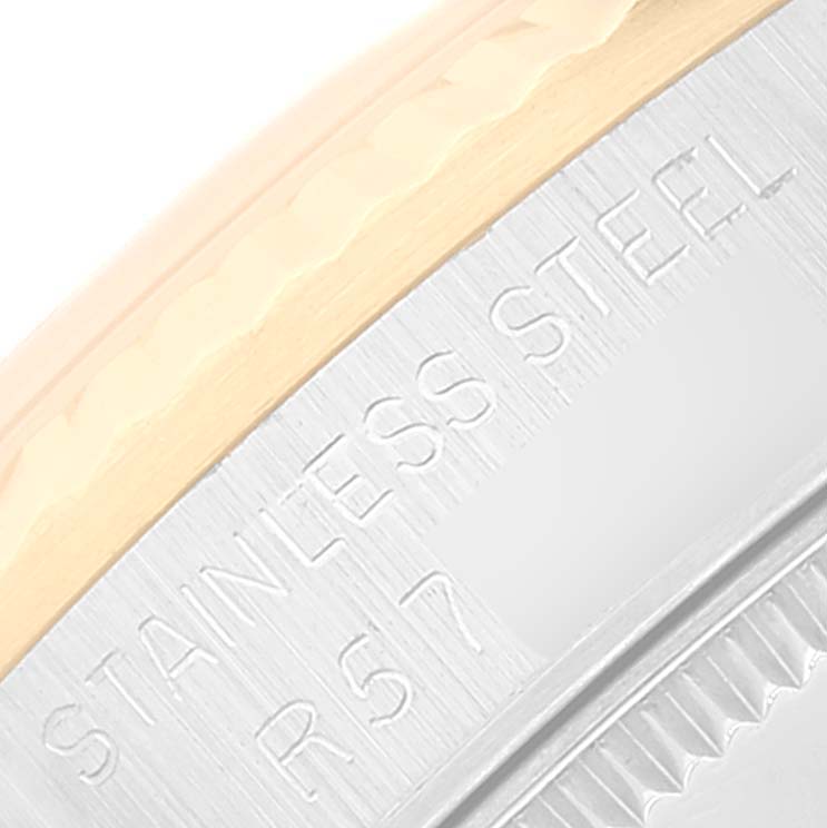 This close-up image shows part of the stainless steel case of a Rolex Mid-Size 68273 Women
s Steel and Gold (two tone) White Dial 68273 Women
s Steel and Gold (two tone) White Dial model watch.