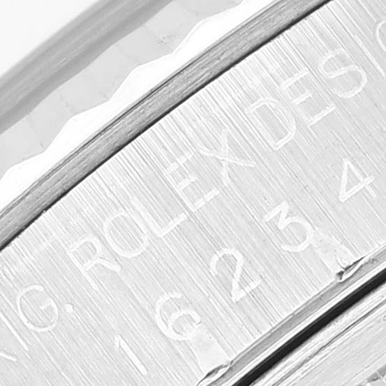 This close-up image shows the engraved side of the casing for the Rolex Datejust 16234 Men's Stainless Steel Black Dial 16234 Men's Stainless Steel Black Dial watch.