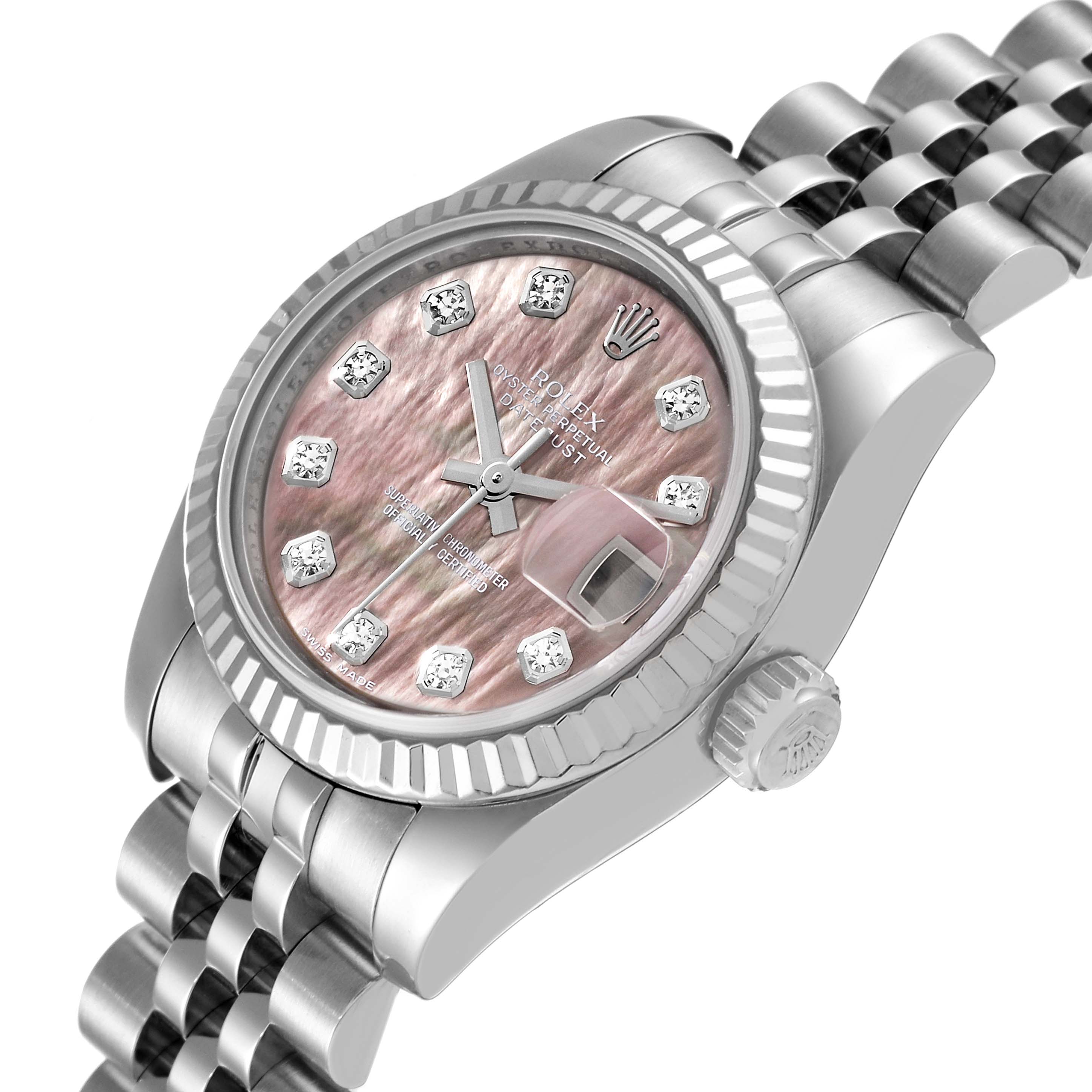 This image shows a Rolex Datejust 179174 Women's Stainless Steel Mother of Pearl Dial 179174 Women's Stainless Steel Mother of Pearl Dial watch from a slightly tilted top view, emphasizing the dial, bezel, and partial bracelet.