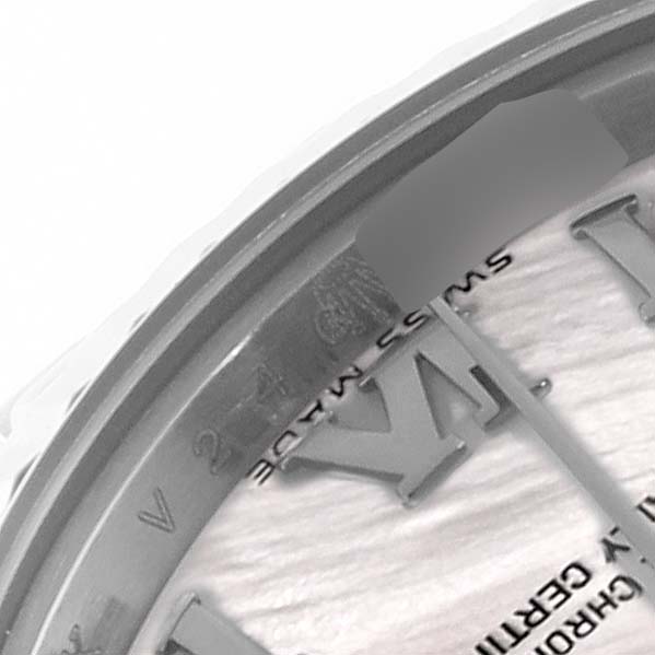The image shows a close-up of the Roman numeral hour markers and the inner bezel of a Rolex Datejust 179174 Women's Stainless Steel Mother of Pearl Dial 179174 Women's Stainless Steel Mother of Pearl Dial watch.