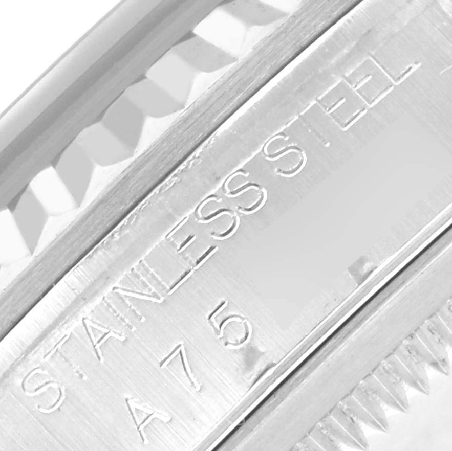 The image shows a close-up of the stainless steel engraving on the side of a Rolex Datejust 16234 Men's Stainless Steel Silver Dial 16234 Men's Stainless Steel Silver Dial watch case.
