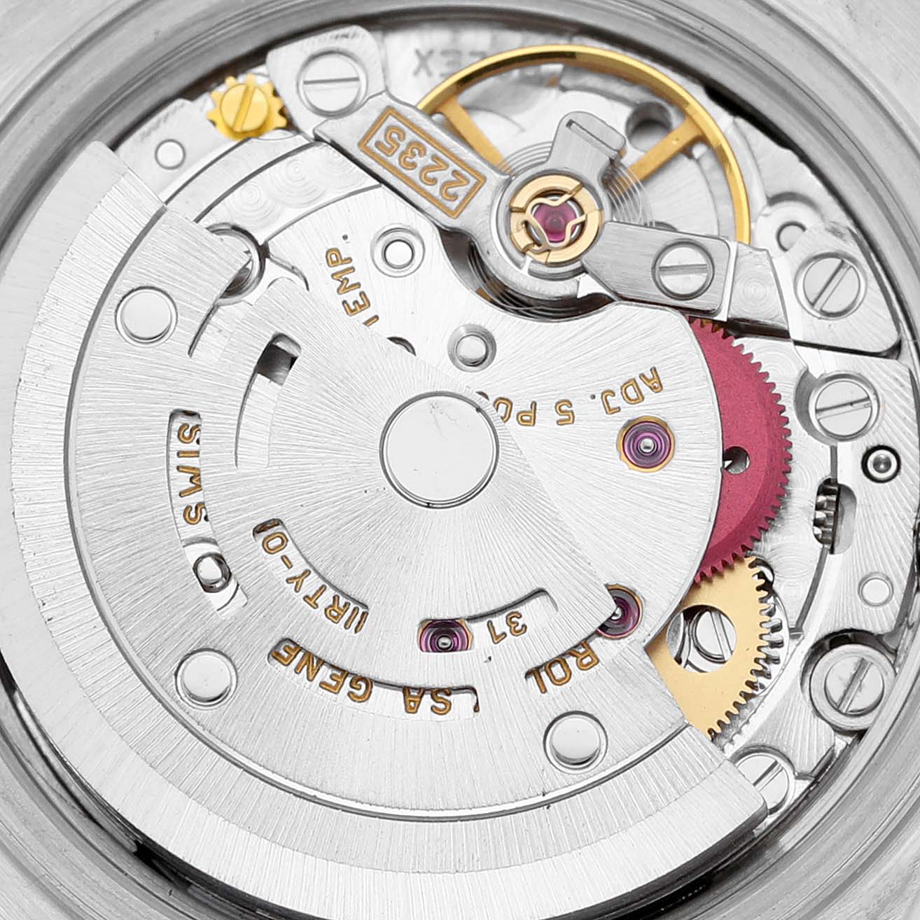 This is an angled close-up of the Rolex Datejust 79173 Women's Steel and Gold (two tone) Black Dial 79173 Women's Steel and Gold (two tone) Black Dial watch's internal mechanical movement.